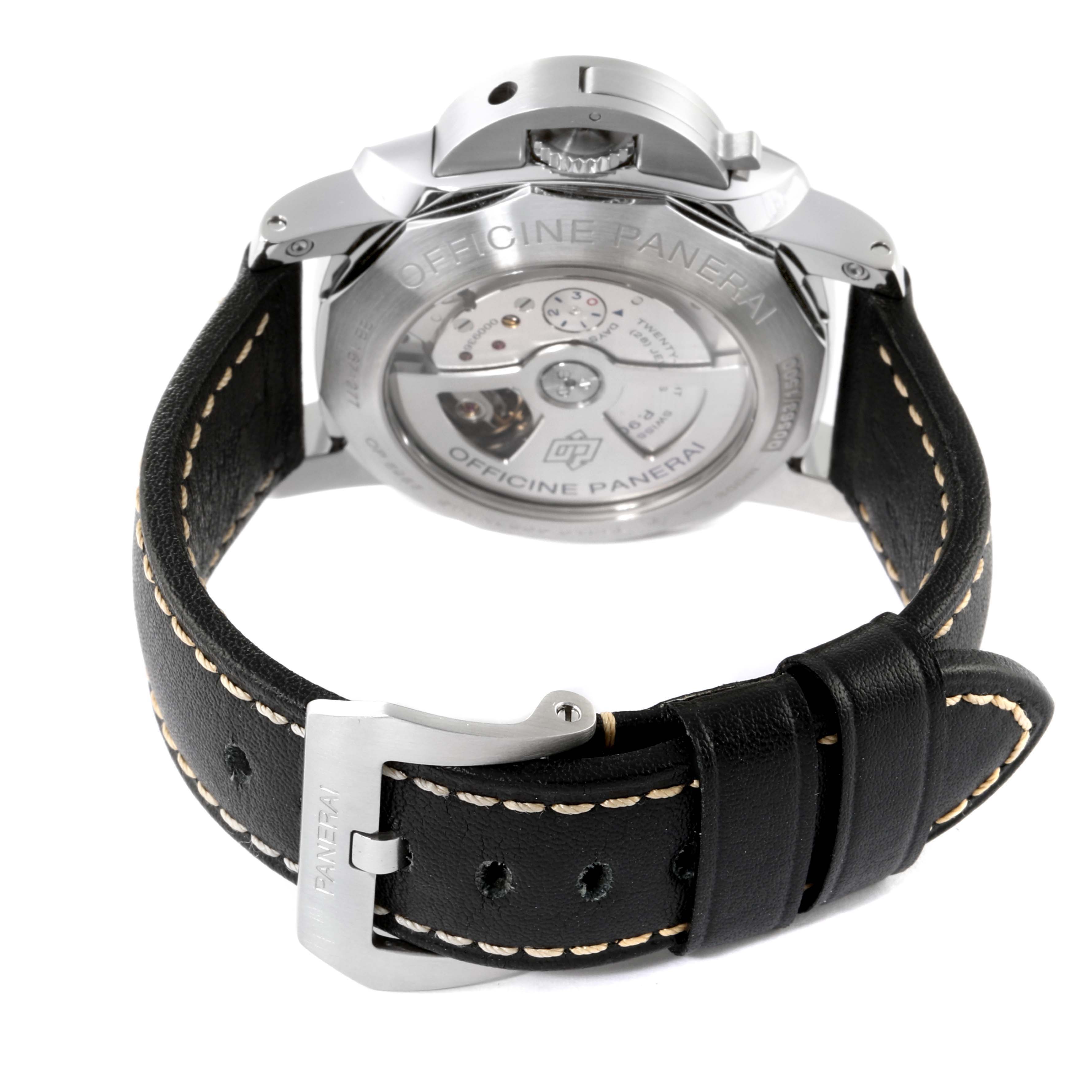The image shows the back view of the Panerai Luminor PAM00531 Men
s Stainless Steel Black Dial PAM00531 Men
s Stainless Steel Black Dial watch, displaying its movement and leather strap with stitching.