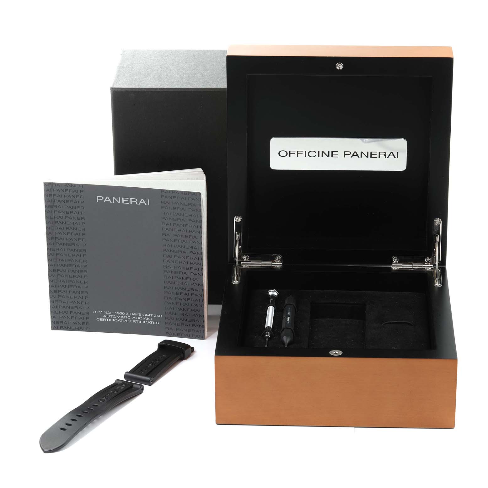 The image shows a top view of Panerai Luminor PAM00531 Men
s Stainless Steel Black Dial PAM00531 Men
s Stainless Steel Black Dial watch accessories including a box, tools, an additional strap, and documentation.