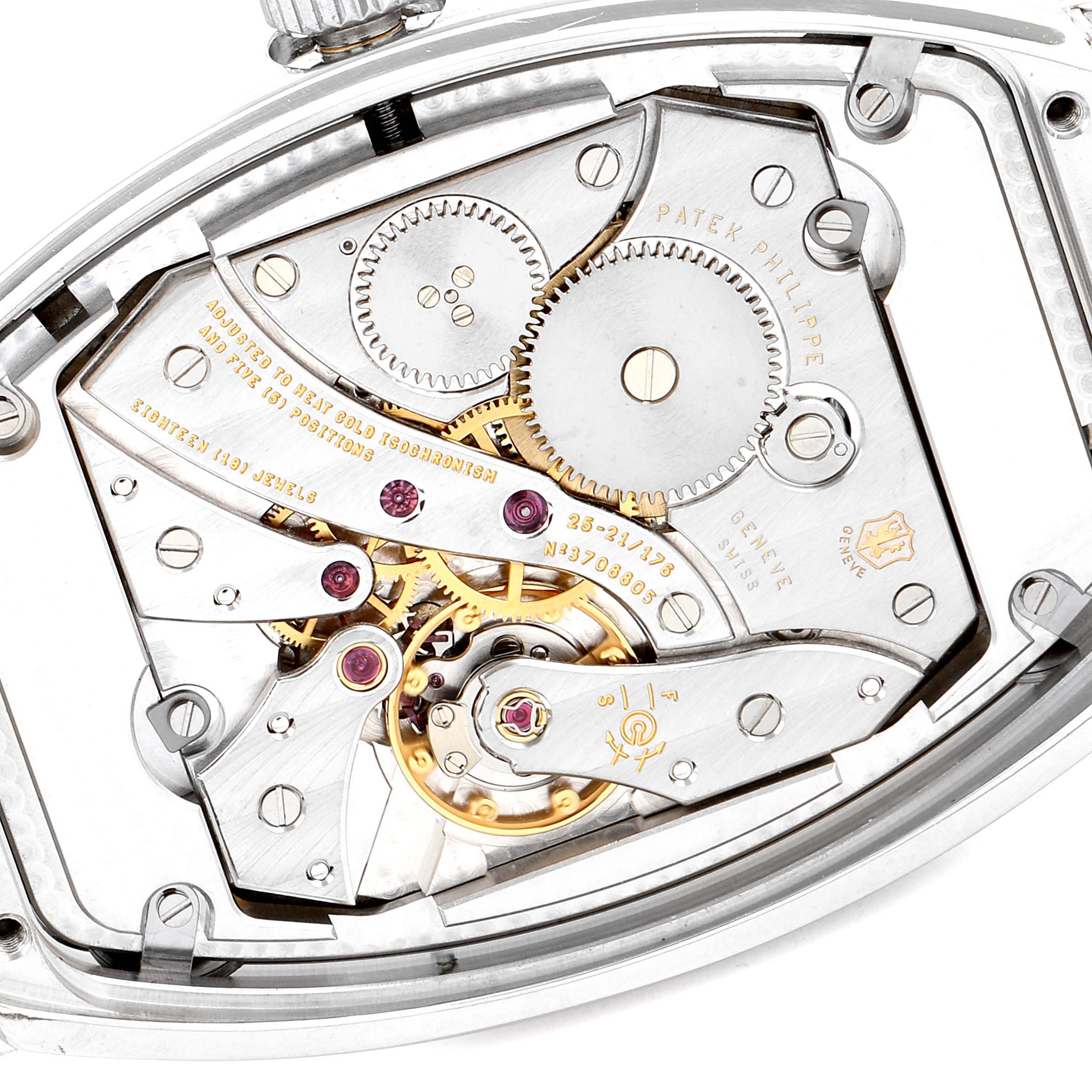 The image shows the intricate movement mechanism of a Patek Philippe Gondolo 5098P Men's Platinum Silver Dial 5098P Men's Platinum Silver Dial watch.