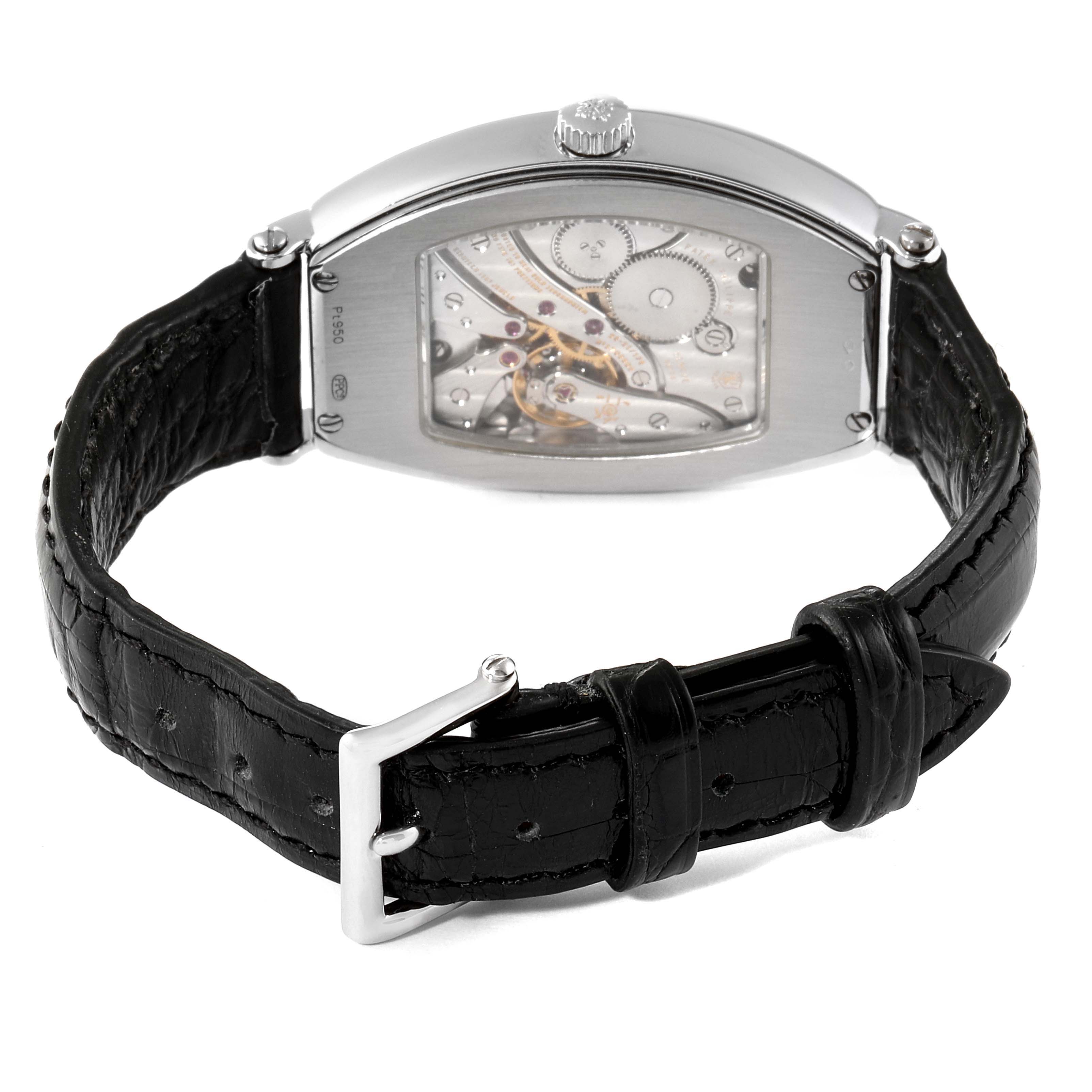The image shows the back view of a Patek Philippe Gondolo 5098P Men's Platinum Silver Dial 5098P Men's Platinum Silver Dial watch, highlighting the movement and leather strap.