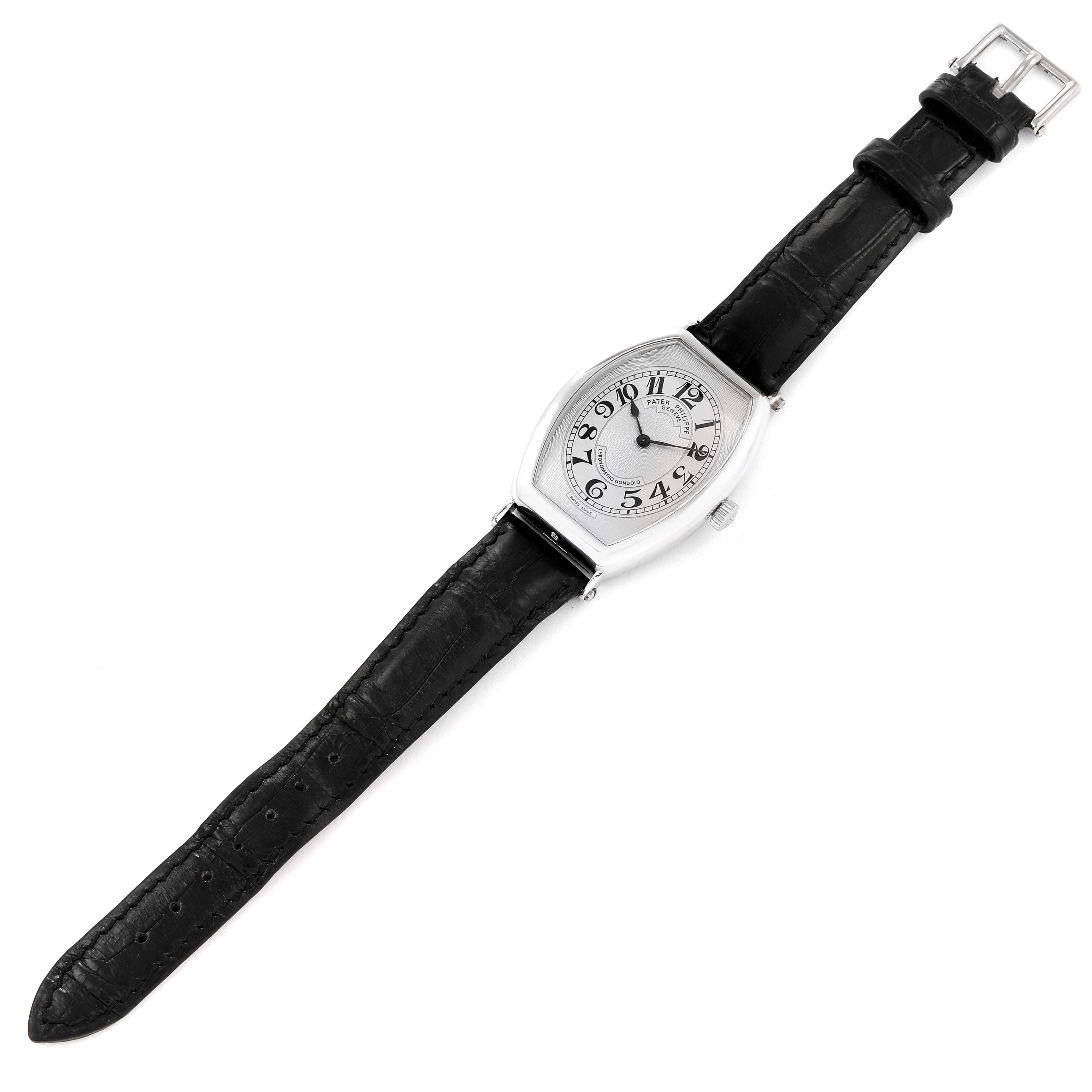 This image shows a Patek Philippe Gondolo 5098P Men's Platinum Silver Dial 5098P Men's Platinum Silver Dial watch from a top view, displaying the watch face, black leather strap, and buckle.