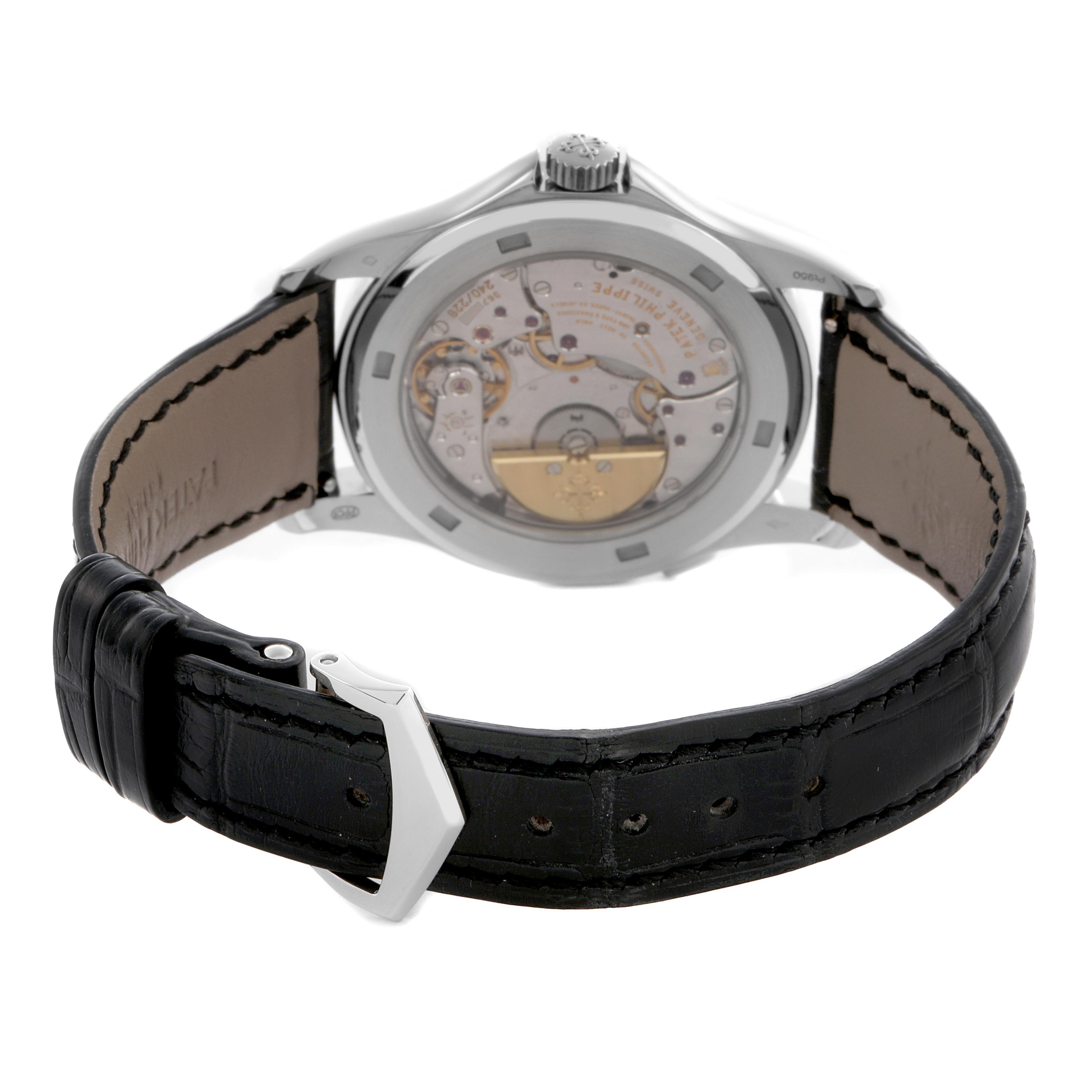 The Patek Philippe Complications 5130P Men
s Platinum Silver Dial 5130P Men
s Platinum Silver Dial watch is shown from the back, highlighting its movement and black leather strap.