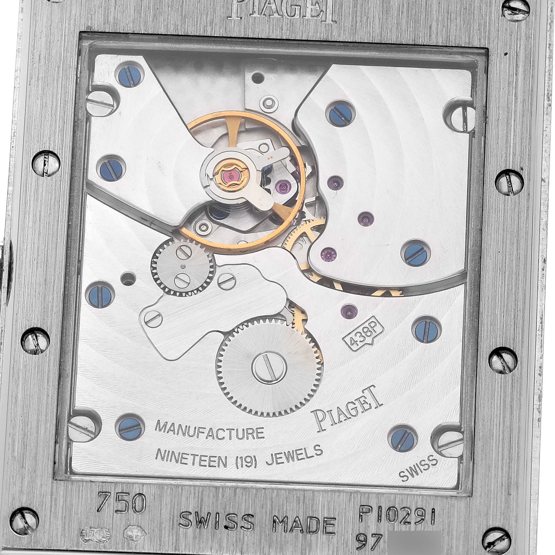 The image shows the back view of a Piaget P10291 Men's White Gold Silver Dial Black Tie White Gold Diamond Mens Watch P10291, highlighting its intricate movement.