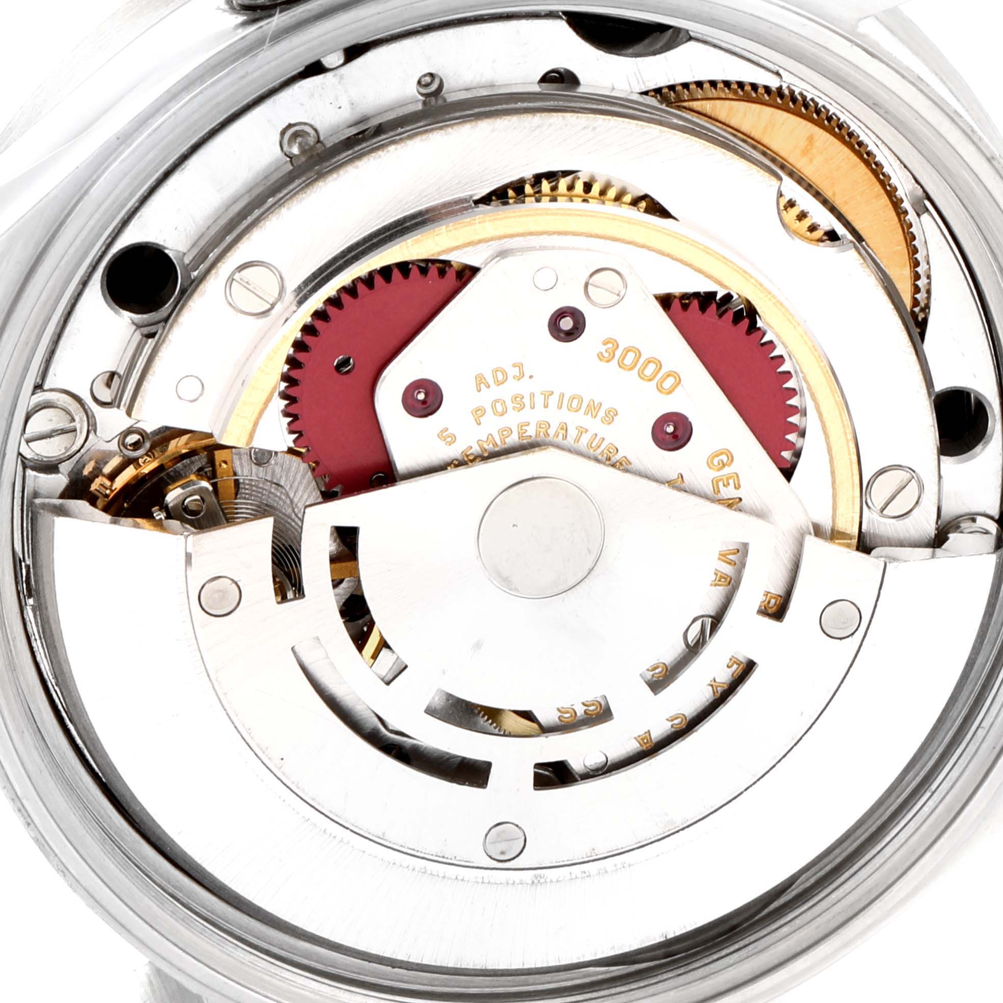 The image shows a close-up view of the internal mechanism of the Rolex Air-King 14010 Men's Stainless Steel Black Dial 14010 Men's Stainless Steel Black Dial watch, highlighting gears and movement parts.