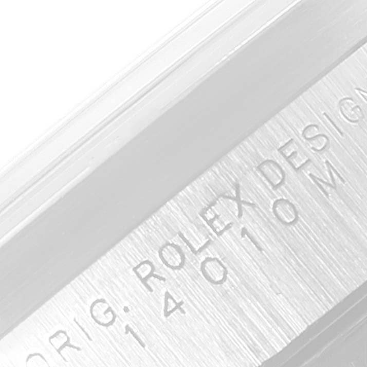 The image shows a close-up angle of the side engraving on a Rolex Air-King 14010 Men's Stainless Steel Blue Dial 14010 Men's Stainless Steel Blue Dial watch, displaying the model number and "Orig. Rolex Design."