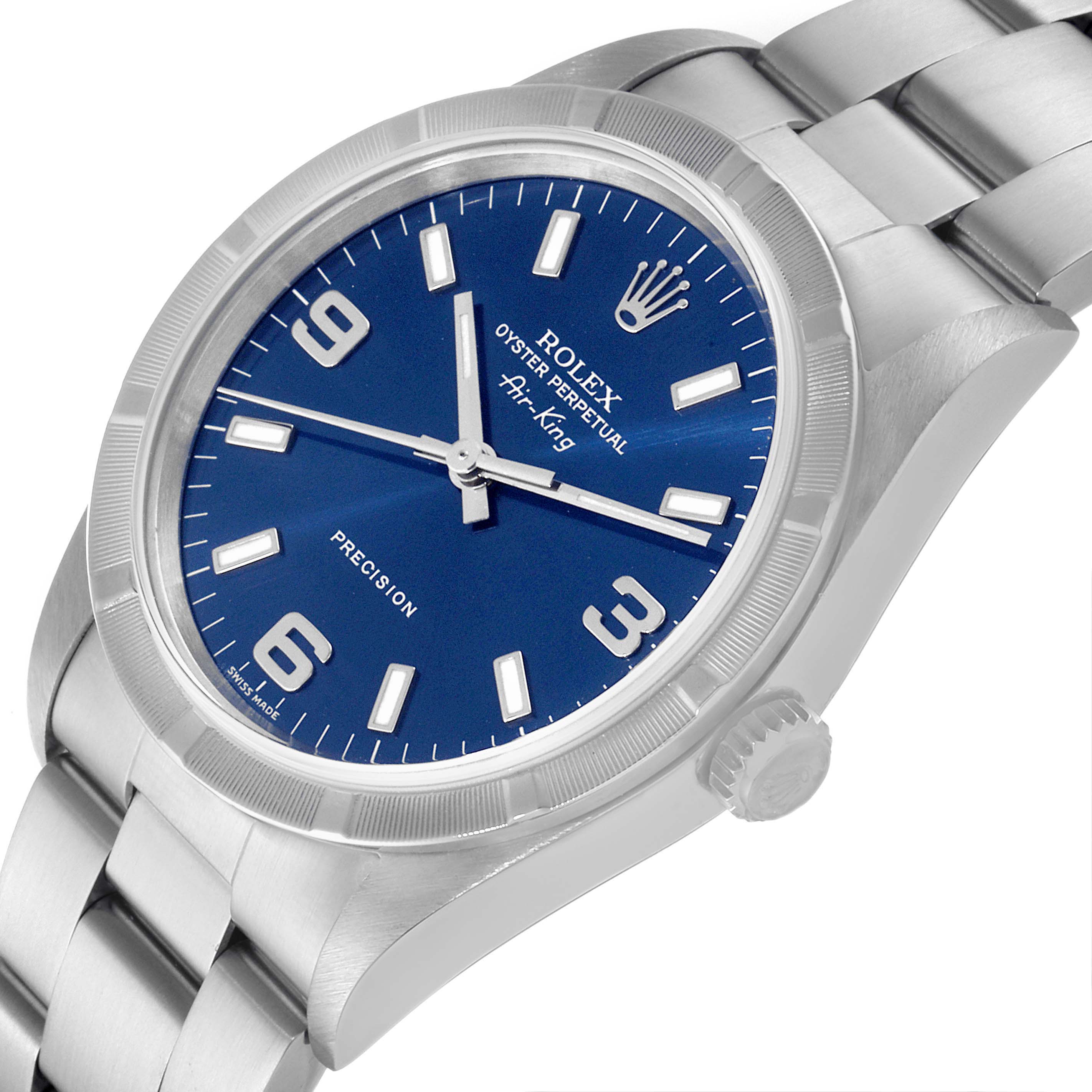 The Rolex Air-King 14010 Men's Stainless Steel Blue Dial 14010 Men's Stainless Steel Blue Dial watch is shown at an angled view, displaying the dial, crown, and part of the bracelet.