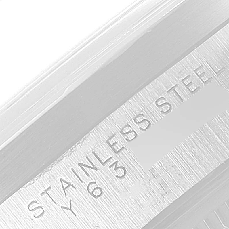 This image shows a close-up of the inner bezel with "STAINLESS STEEL" engraving on a Rolex Air-King 14010 Men's Stainless Steel Blue Dial 14010 Men's Stainless Steel Blue Dial watch.