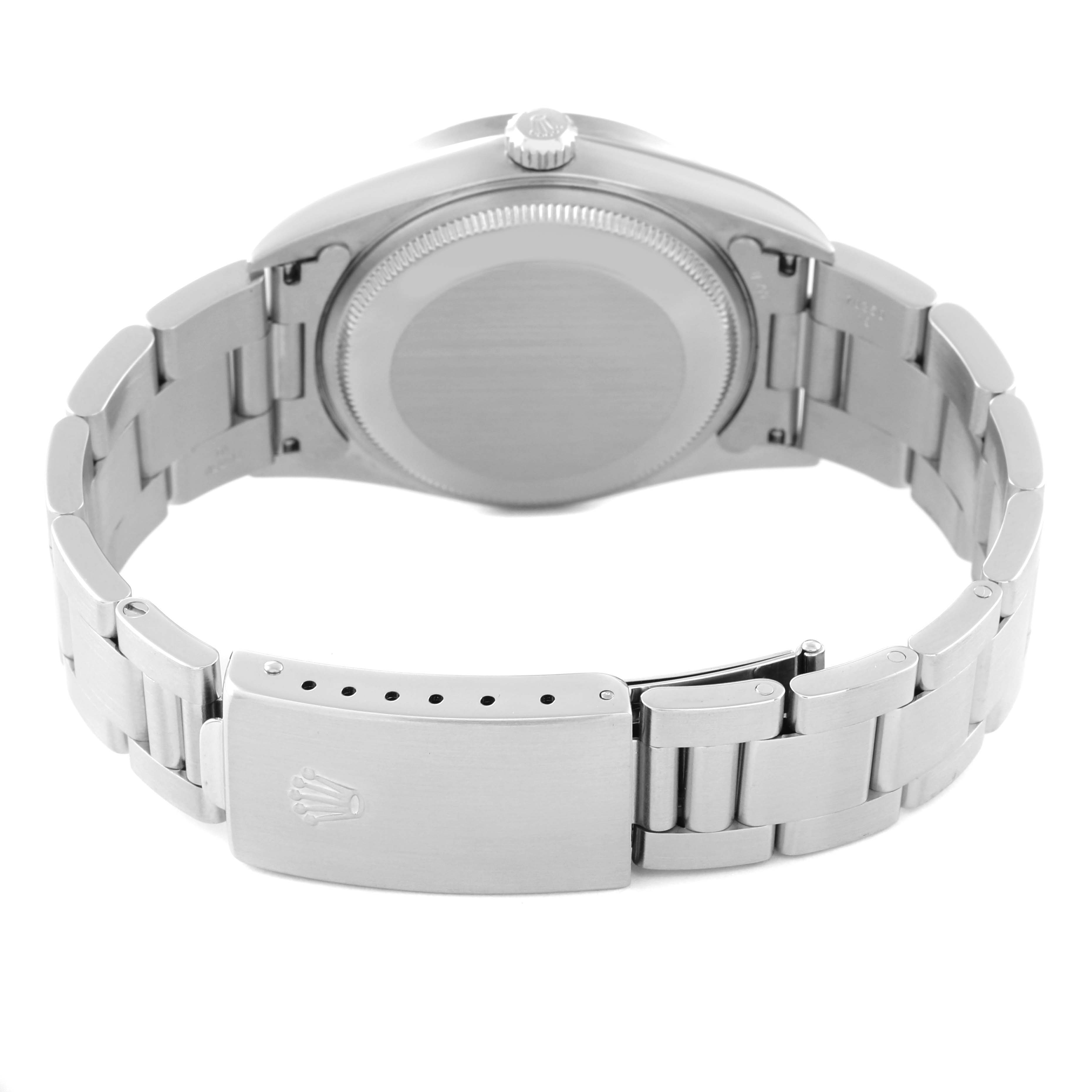 The image shows the back view of a Rolex Air-King 14010 Men's Stainless Steel Pink Dial 14010 Men's Stainless Steel Pink Dial watch, highlighting the case back and stainless steel bracelet.