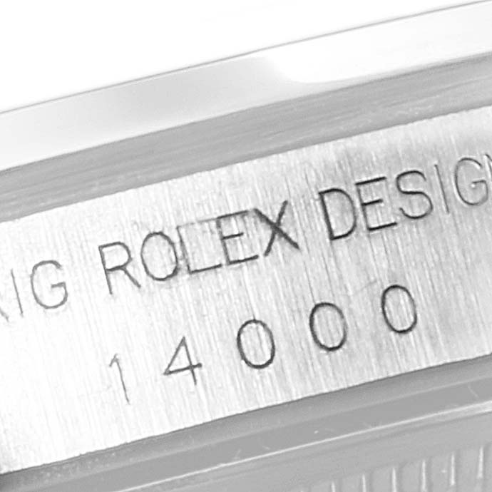 The image shows a close-up of the engraved model number and "ROLEX DESIGN" text on the back case of a Rolex Air-King 14000 Men's Stainless Steel Silver Dial 14000 Men's Stainless Steel Silver Dial watch.