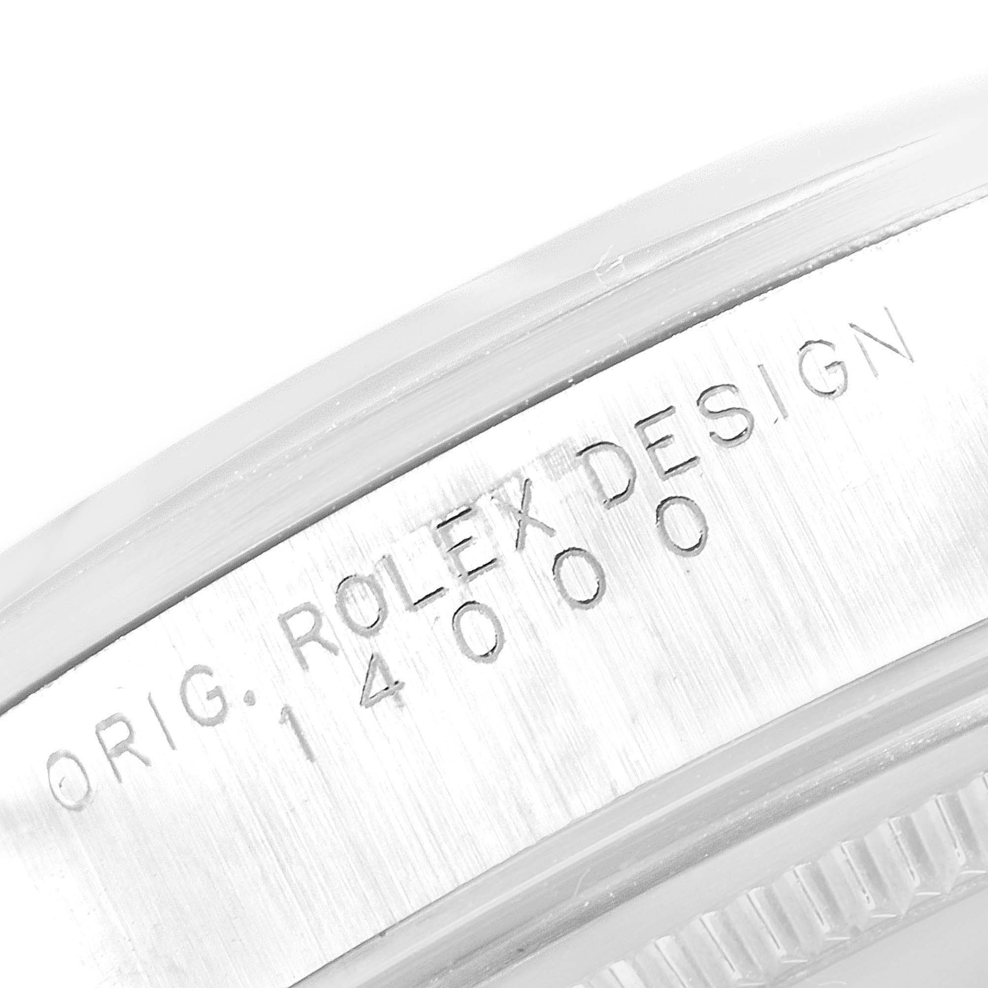 The image shows the side view of a Rolex Air-King 14000 Men's Stainless Steel Silver Dial 14000 Men's Stainless Steel Silver Dial watch case with the model number and "ROLEX DESIGN" engraving.