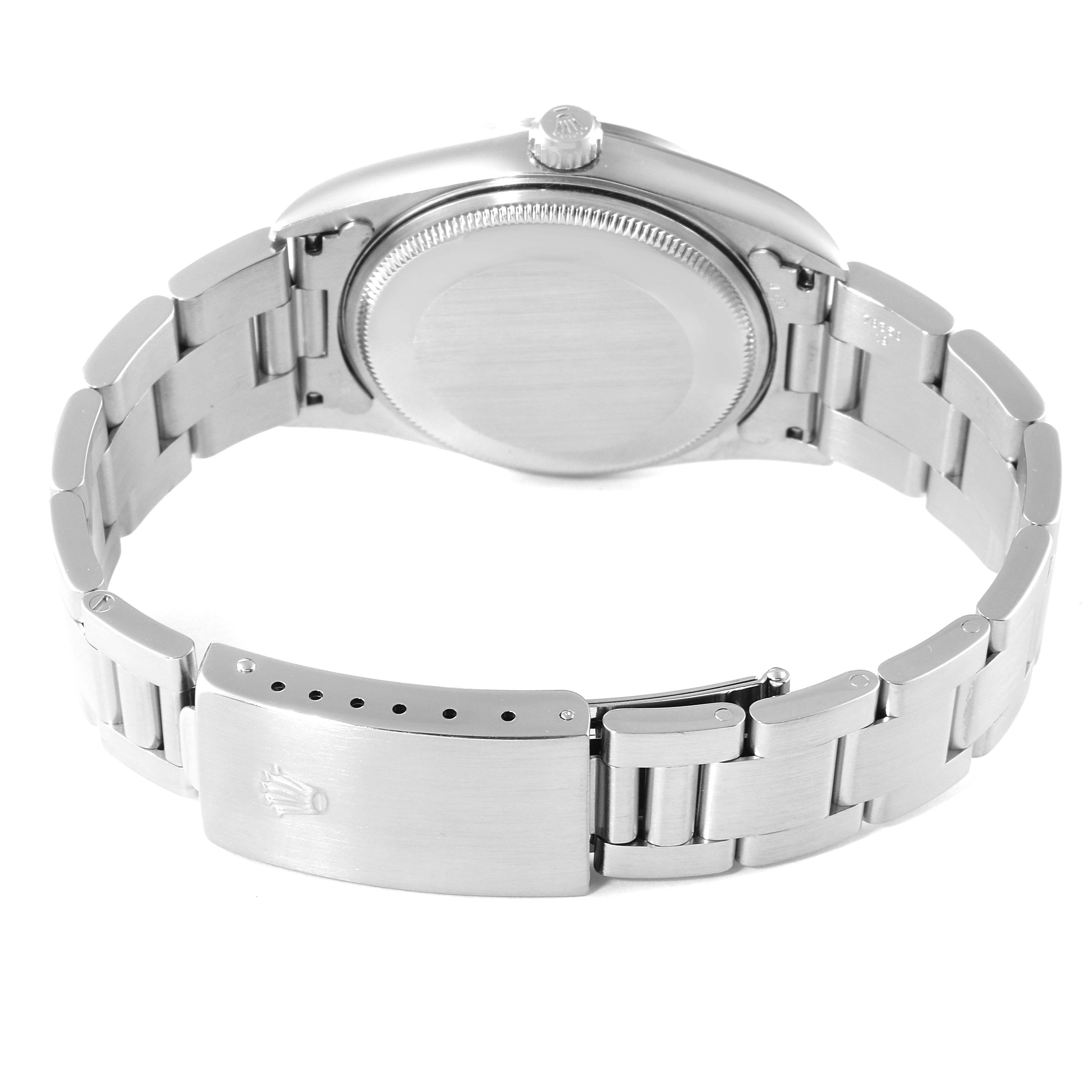 This image shows the back view of a Rolex Air-King 14000 Men's Stainless Steel Black Dial 14000 Men's Stainless Steel Black Dial watch, including the case back and metal bracelet with clasp.