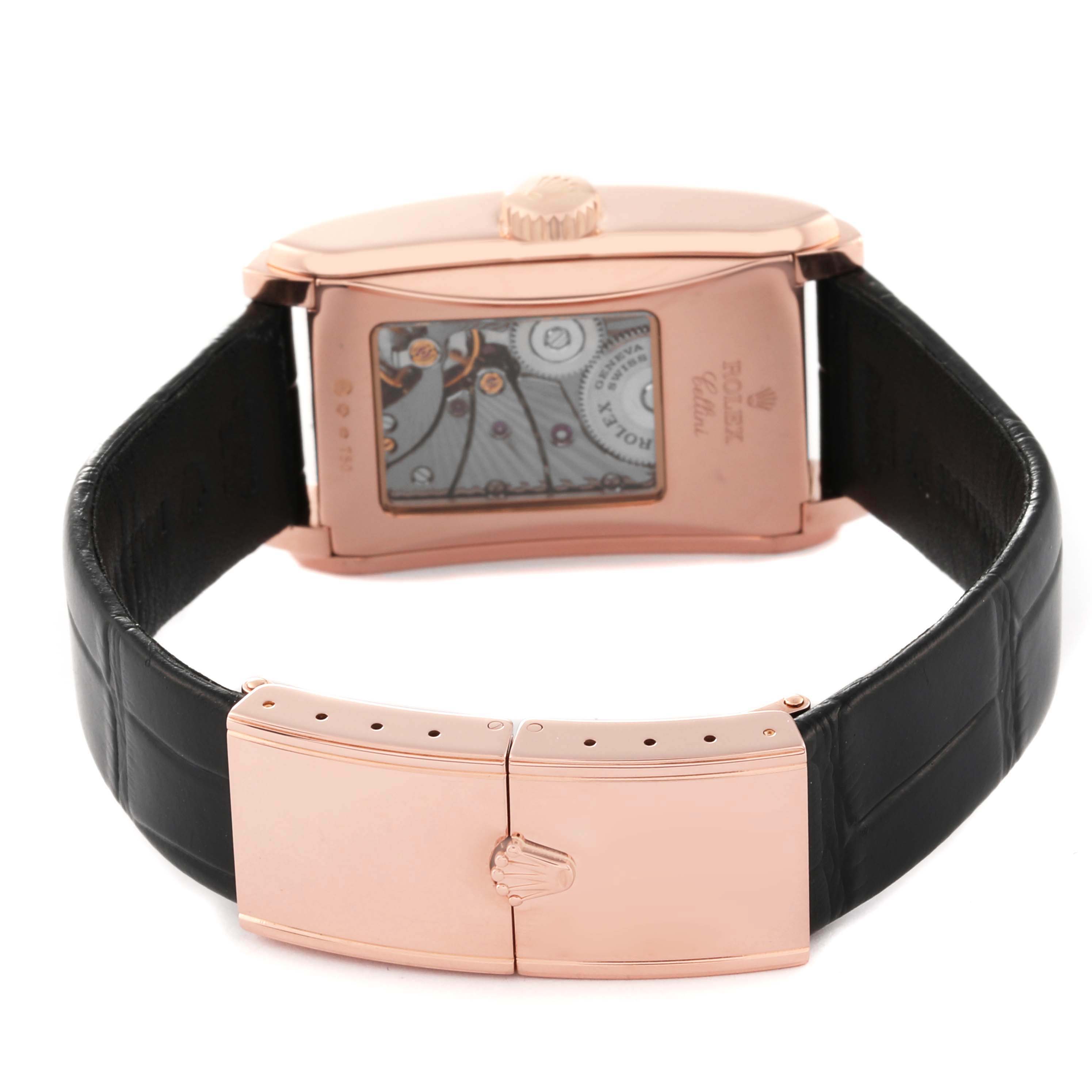 This image shows the back view of the Rolex Cellini 5442/5 Men's Rose Gold Black Dial 5442/5 Men's Rose Gold Black Dial watch, highlighting its movement mechanism and black leather strap with a clasp.