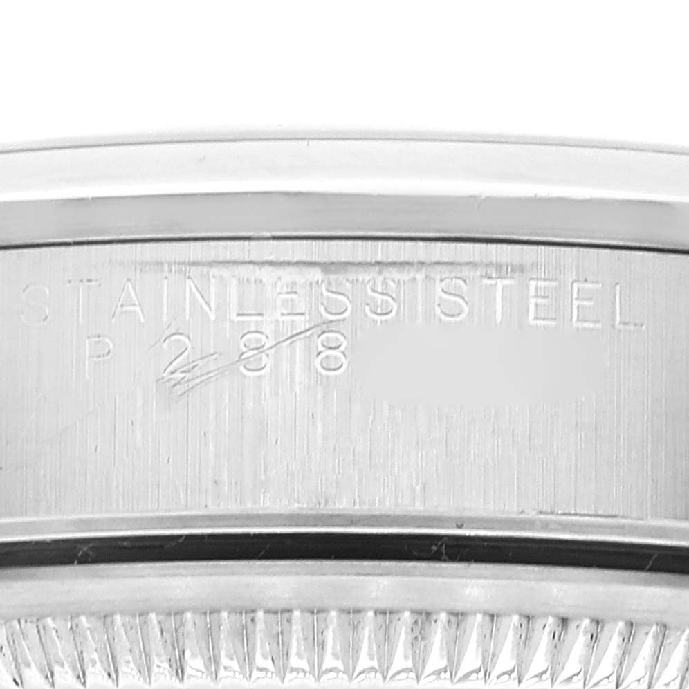 This image shows a close-up of the case back engraving on a stainless steel Rolex Date 15200 Men's Stainless Steel Black Dial 15200 Men's Stainless Steel Black Dial model.