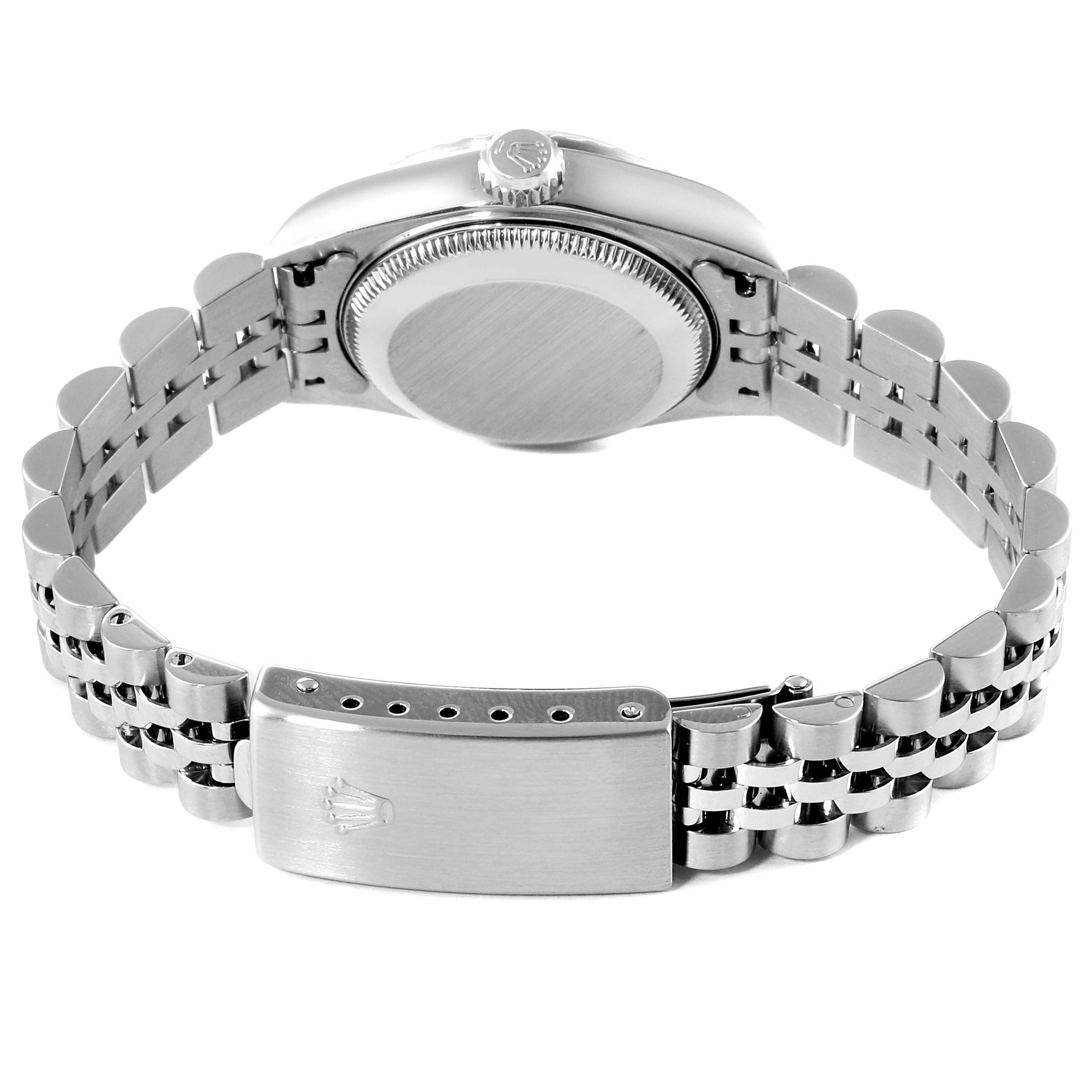 This image shows the backside, crown, case, and bracelet of the Rolex Date 79240 Women's Stainless Steel Pink Dial 79240 Women's Stainless Steel Pink Dial model watch.