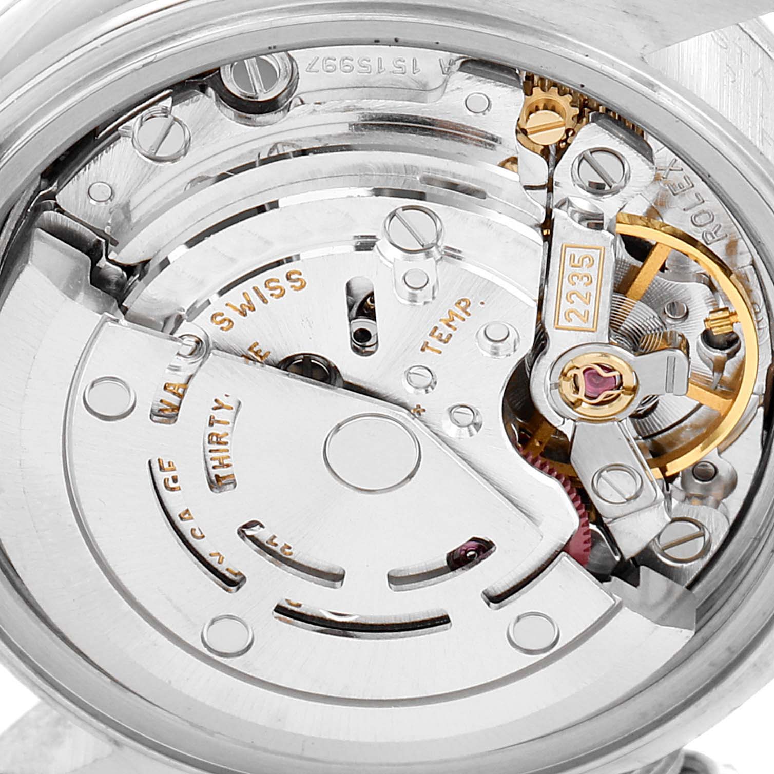 This image shows the movement and internal mechanism of a Rolex Date 79240 Women's Stainless Steel Pink Dial 79240 Women's Stainless Steel Pink Dial model watch.