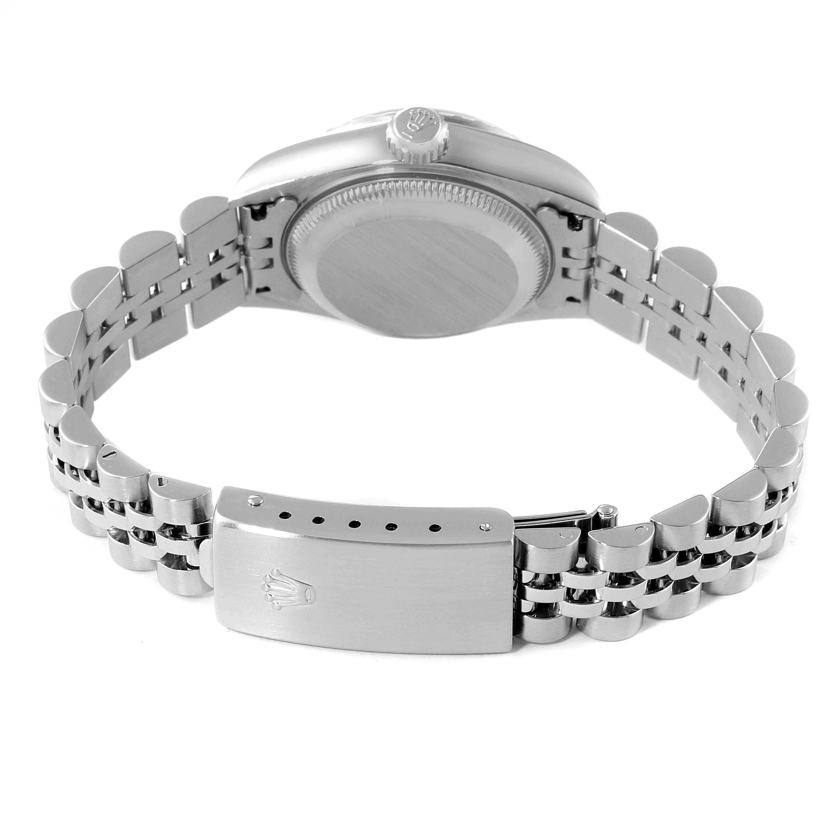 The image shows the backside of a Rolex Date 79240 Women's Stainless Steel Pink Dial 79240 Women's Stainless Steel Pink Dial model, highlighting its bracelet and clasp from an angled view.