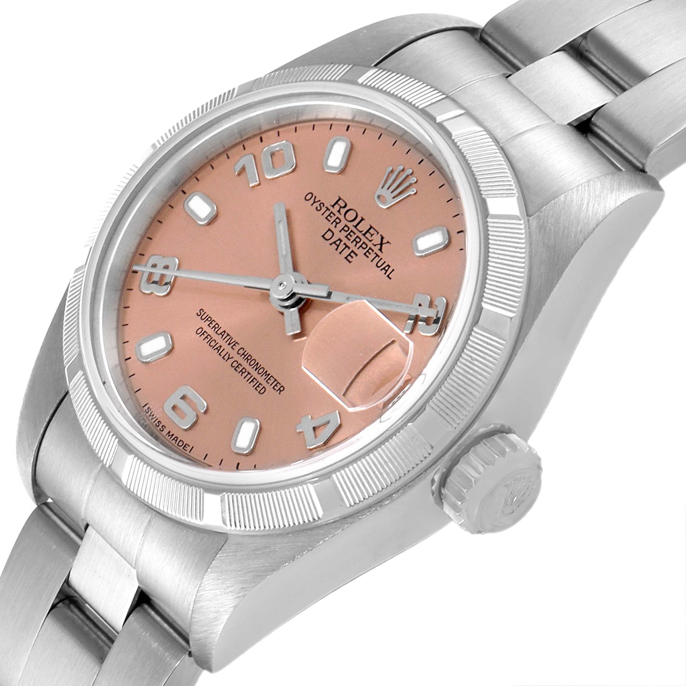 The image shows a Rolex Oyster Perpetual Date watch at an angle displaying the face, bezel, crown, and part of the bracelet.