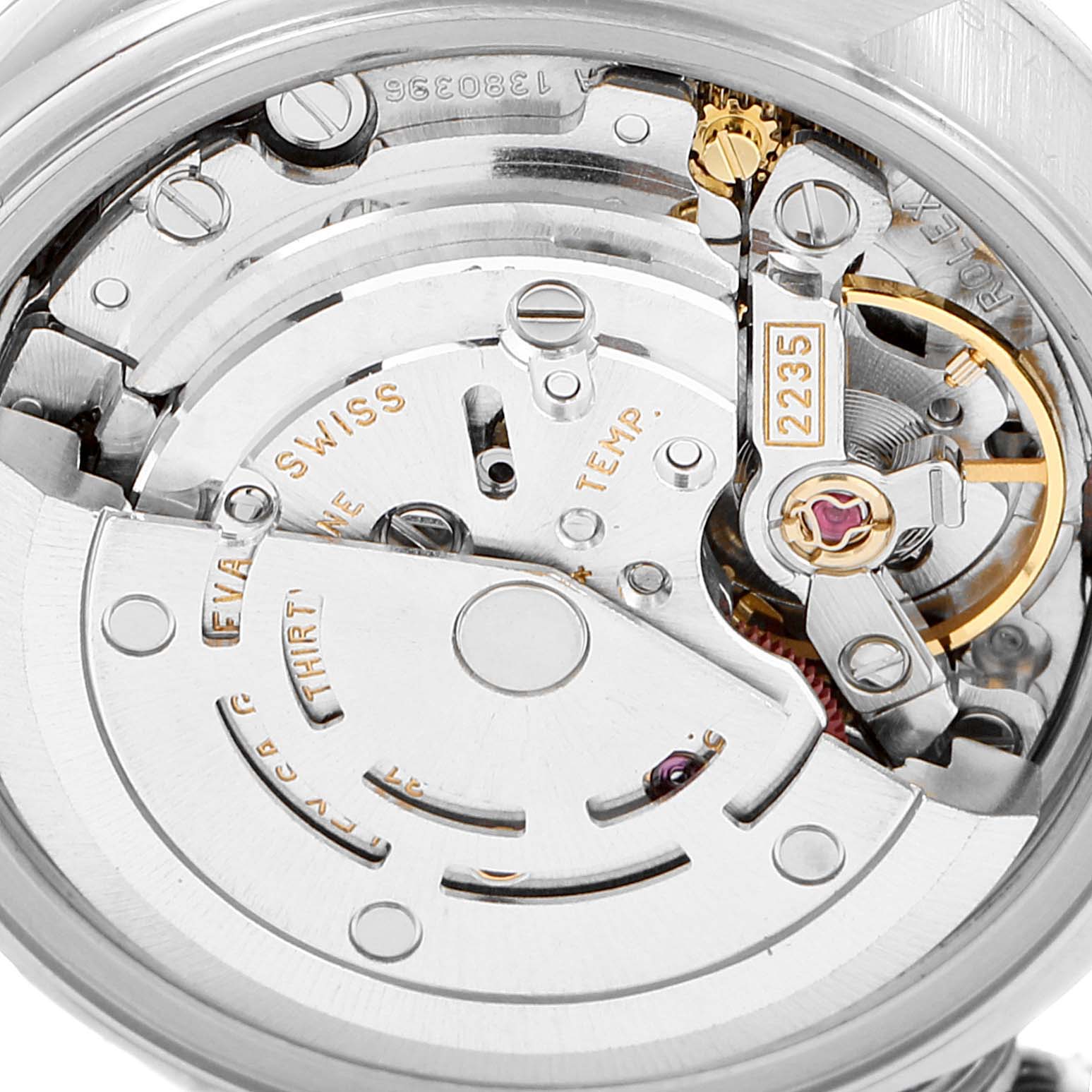 This image displays the inner mechanical movement of a Rolex Date 79190 Women's Stainless Steel Pink Dial 79190 Women's Stainless Steel Pink Dial model watch with its intricate gears and components.