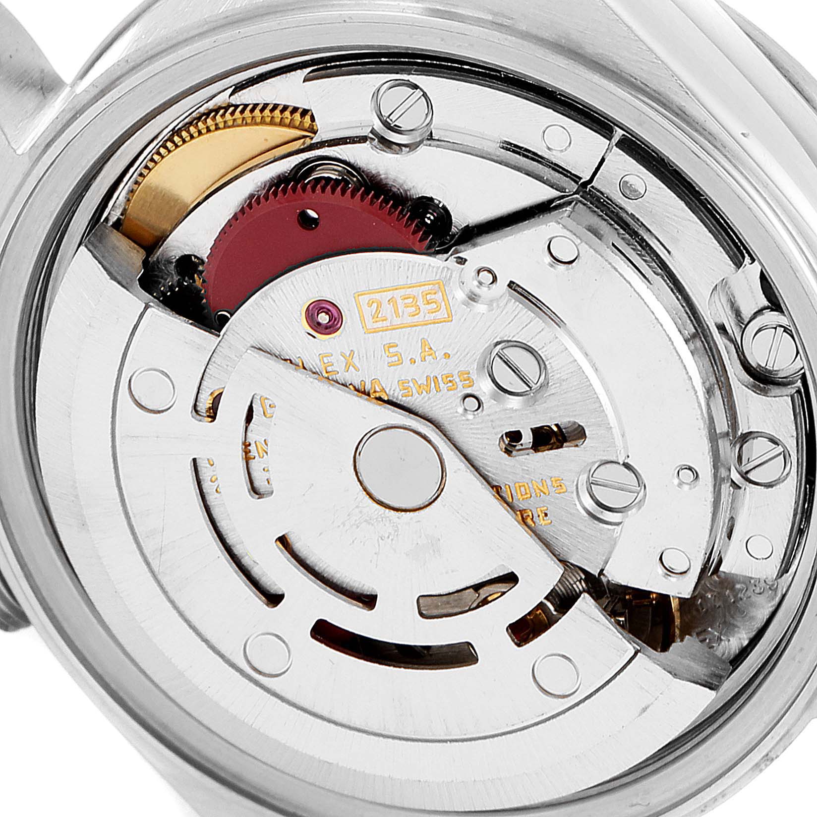 The image shows the movement mechanism of a Rolex Date 69160 Women
s Stainless Steel Silver Dial 69160 Women
s Stainless Steel Silver Dial model watch, viewed from the back.