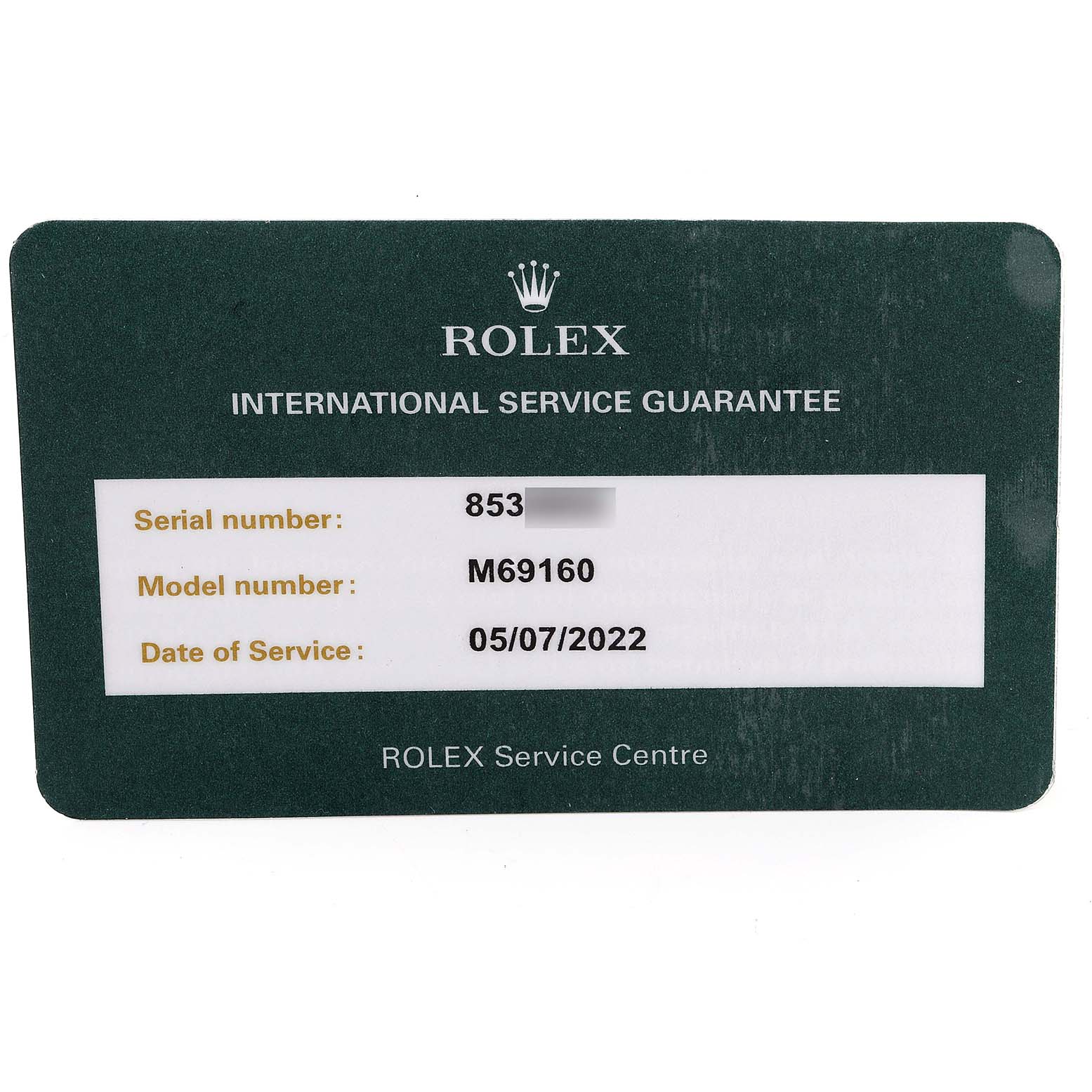 The image shows an International Service Guarantee card for a Rolex Date 69160 Women
s Stainless Steel Silver Dial 69160 Women
s Stainless Steel Silver Dial model M69160, including the serial number and date of service.