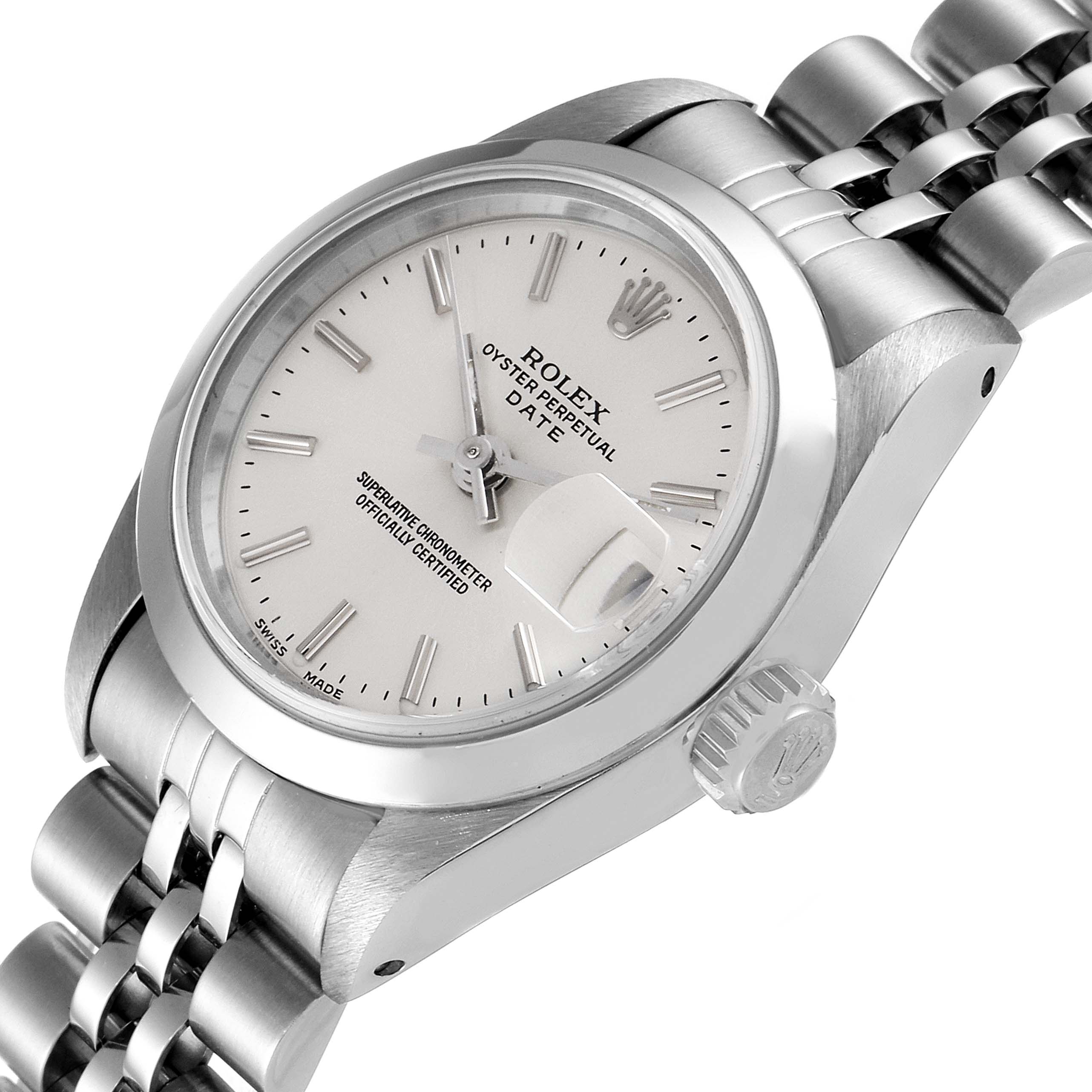 The image shows a close-up, angled view of the face, bezel, crown, and part of the bracelet of a Rolex Date 69160 Women
s Stainless Steel Silver Dial 69160 Women
s Stainless Steel Silver Dial model.
