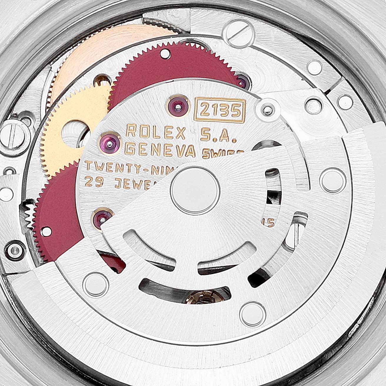 The image shows the intricate inner mechanism of a Rolex Oyster Perpetual 69160 Women's Stainless Steel Silver Dial 69160 Women's Stainless Steel Silver Dial watch, focusing on the movement and gears.