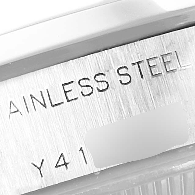 This image shows a close-up angle of the stainless steel case back of a Rolex Date 79160 Women
s Stainless Steel Silver Dial 79160 Women
s Stainless Steel Silver Dial model.