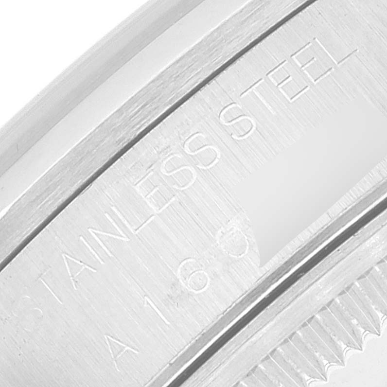 This is a close-up angle showing the stainless steel inscription and part of the bezel of a Rolex Date 15200 Men's Stainless Steel Silver Dial 15200 Men's Stainless Steel Silver Dial watch model.