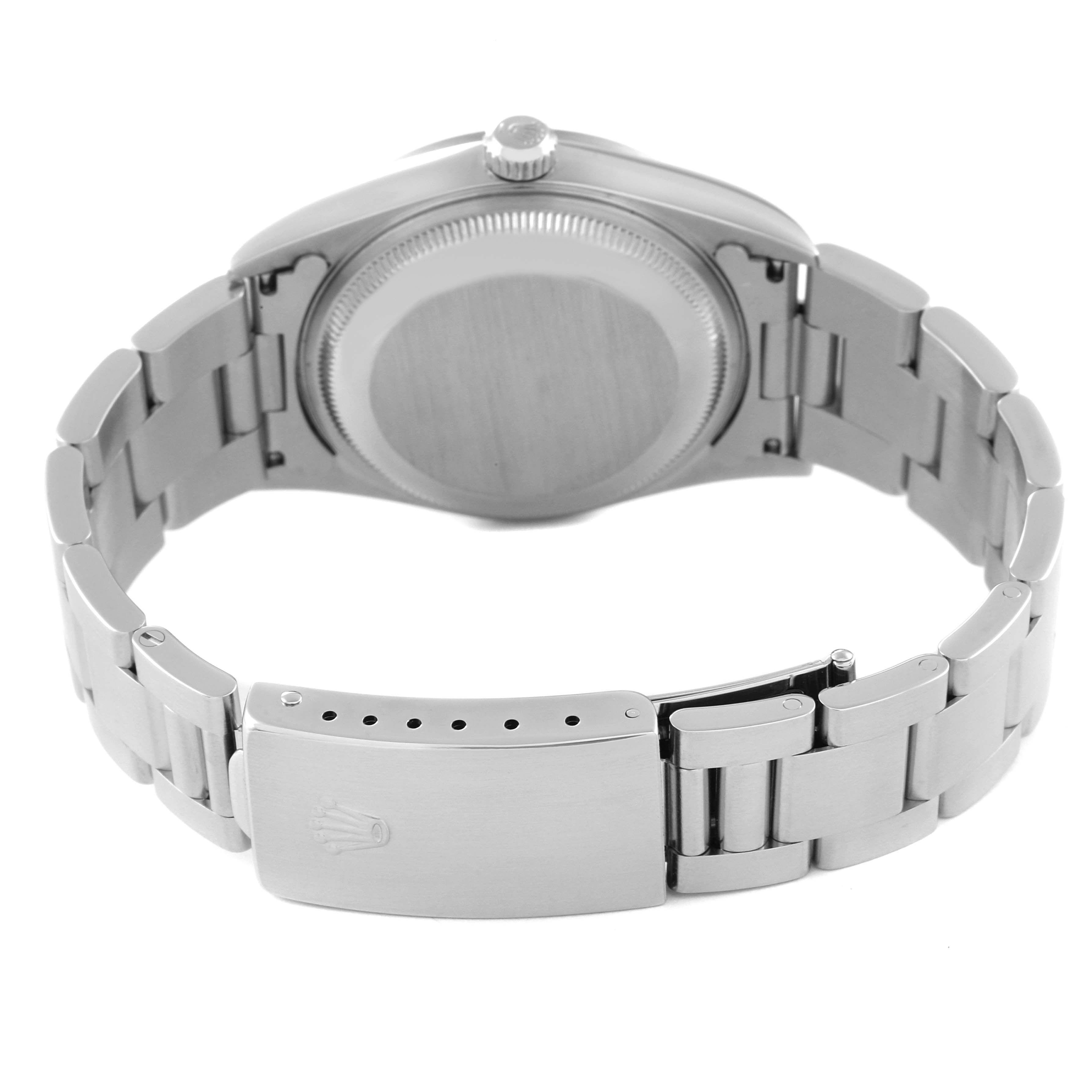 This is a rear view of the Rolex Date 15200 Men's Stainless Steel Silver Dial 15200 Men's Stainless Steel Silver Dial model watch, showing the case back, crown, and metal bracelet with a clasp.