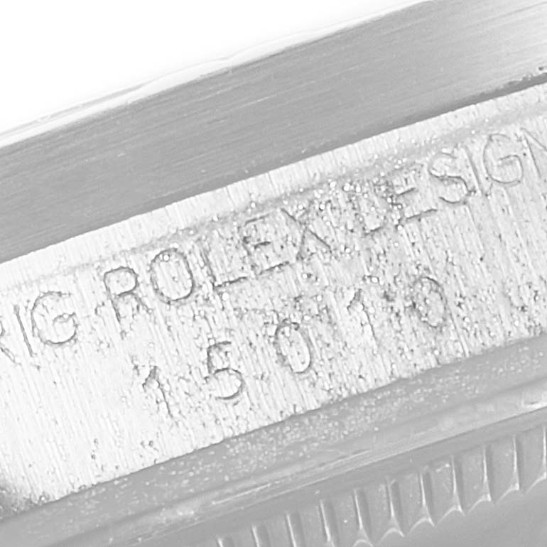 The image shows the engravings on the side of the bezel of a Vintage Collection Rolex watch, highlighting the model and brand name.