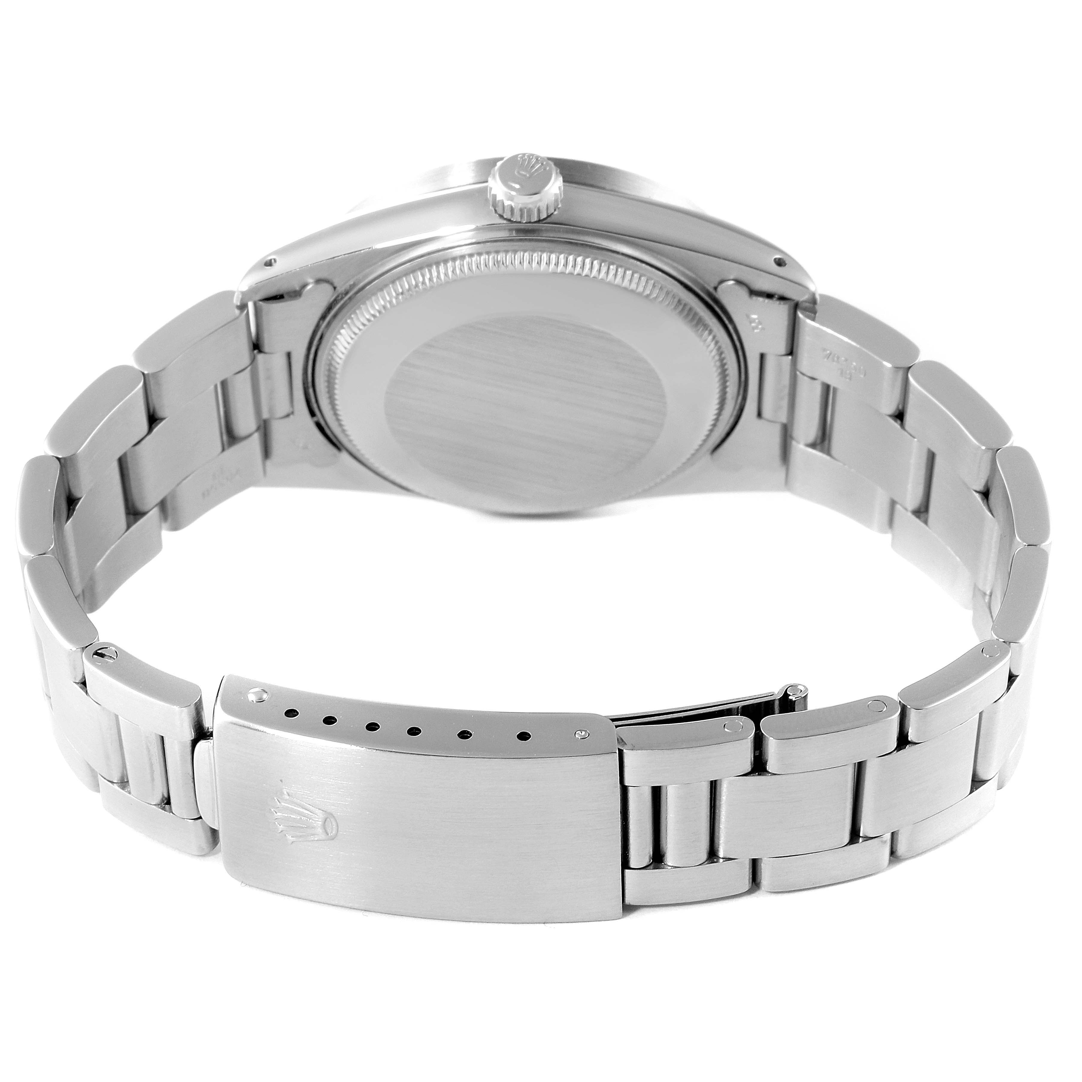 The image shows the back case, crown, and clasp of the Rolex Vintage Collection 15010 Men
s Stainless Steel Silver Dial 15010 Men
s Stainless Steel Silver Dial watch.