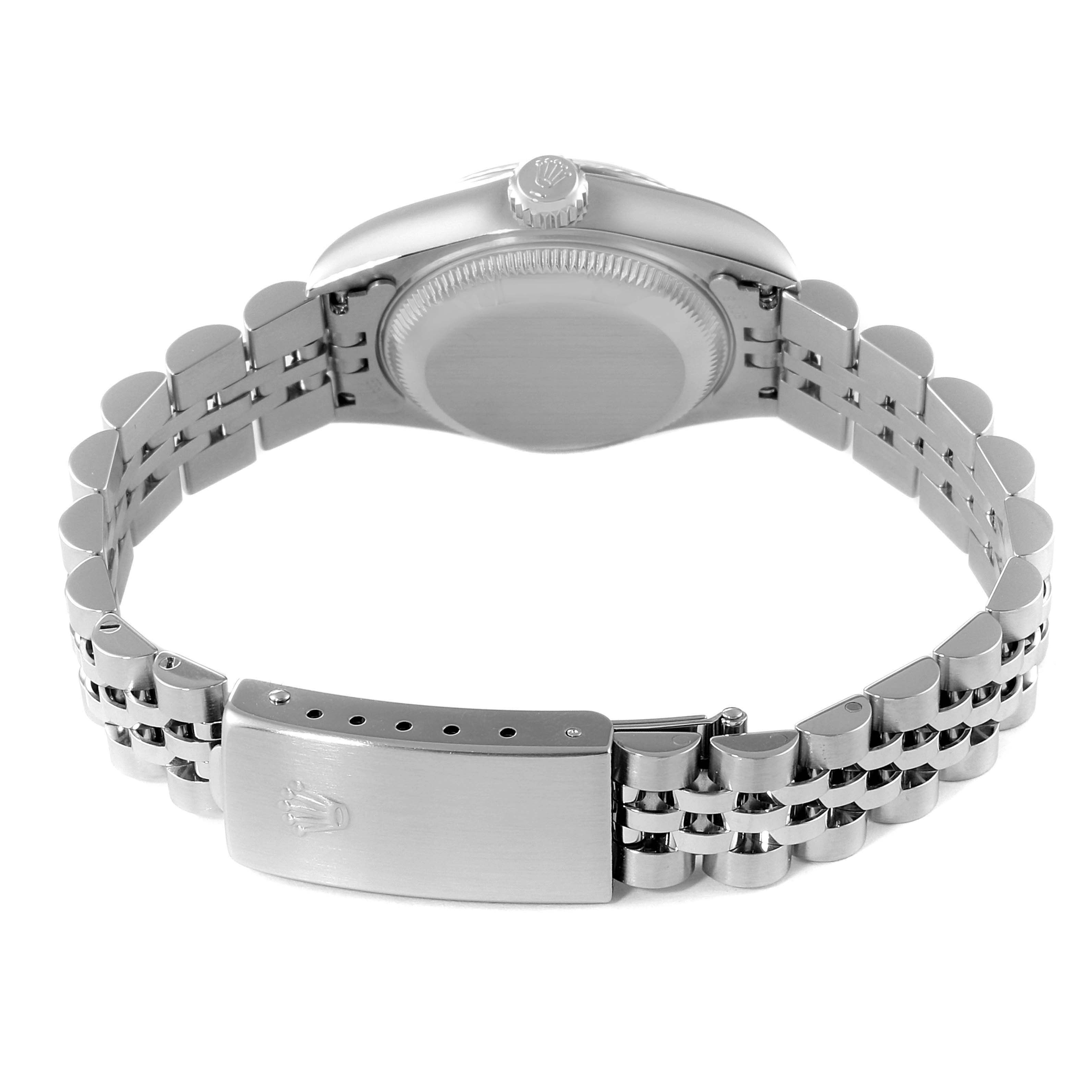 The image shows the back of a Rolex Date 69174 Women
s Stainless Steel White Dial 69174 Women
s Stainless Steel White Dial model watch, highlighting the bracelet and clasp.