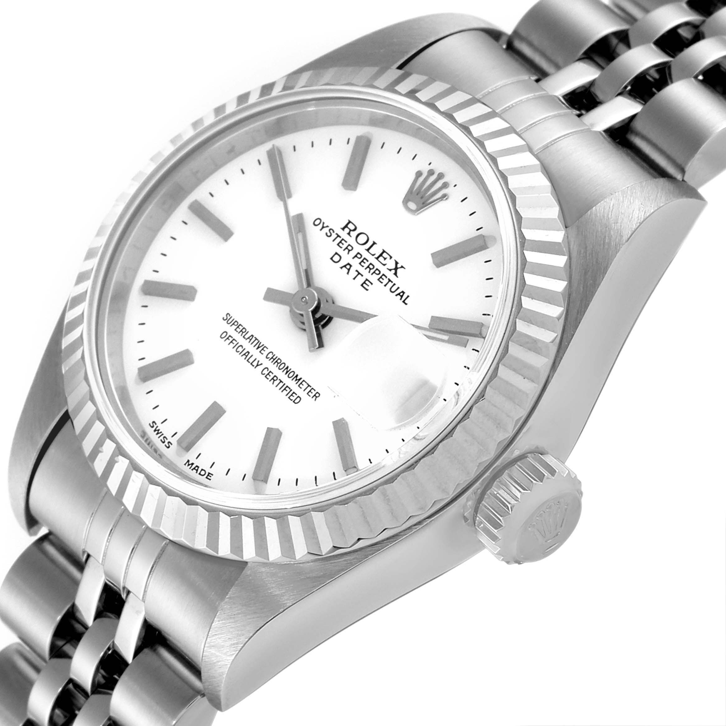 The image displays a close-up, angled view of the Rolex Date 69174 Women
s Stainless Steel White Dial 69174 Women
s Stainless Steel White Dial model watch, highlighting the dial, bezel, and crown.