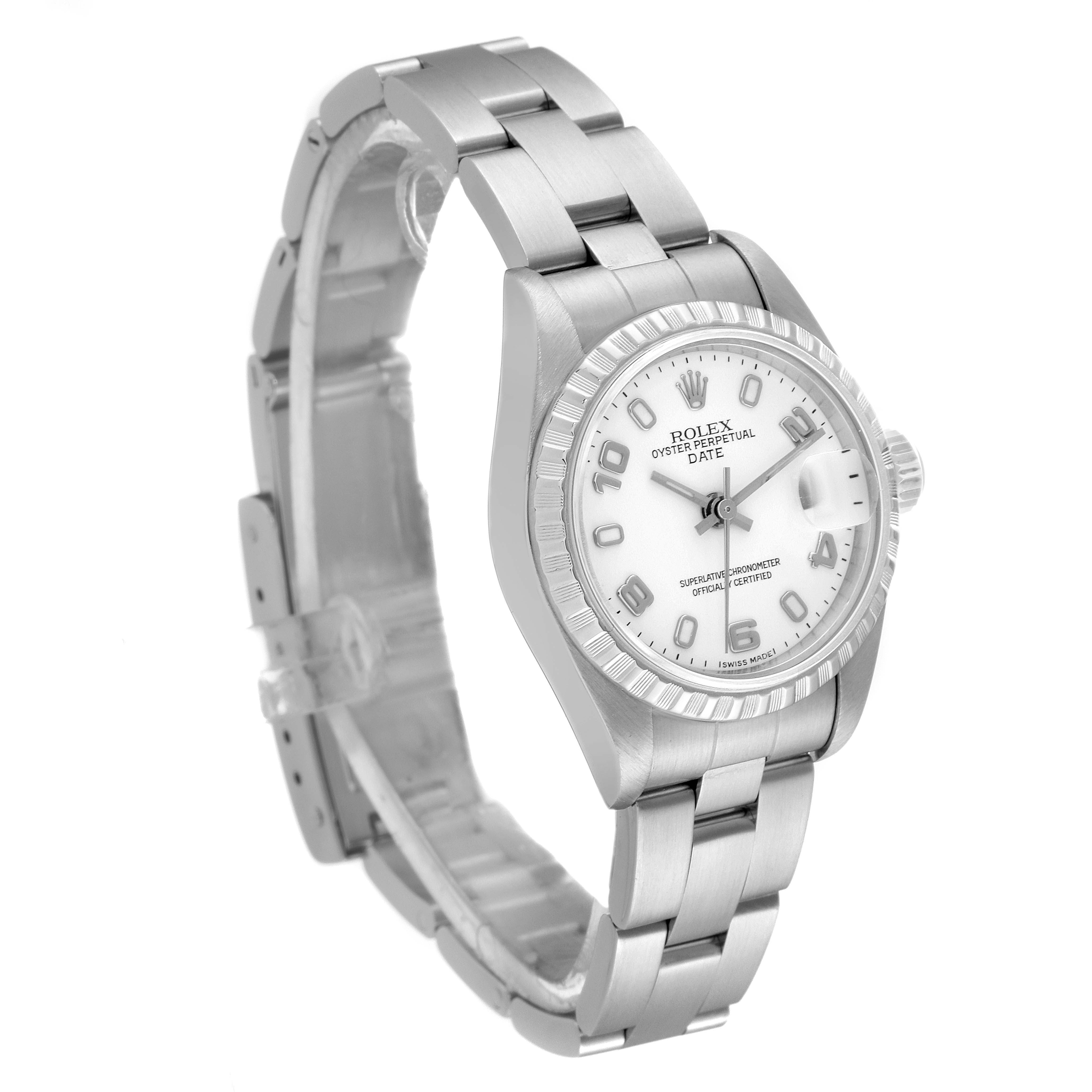 The Rolex Date 79240 Women
s Stainless Steel White Dial 79240 Women
s Stainless Steel White Dial model watch is shown at an angled view, displaying the face, bezel, and bracelet.