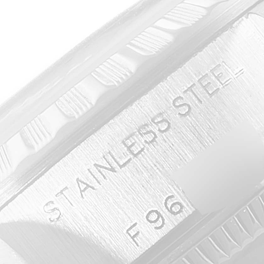 This image shows a close-up angled view of the case side, displaying the "STAINLESS STEEL" marking on the Rolex Date 79240 Women
s Stainless Steel White Dial 79240 Women
s Stainless Steel White Dial model watch.