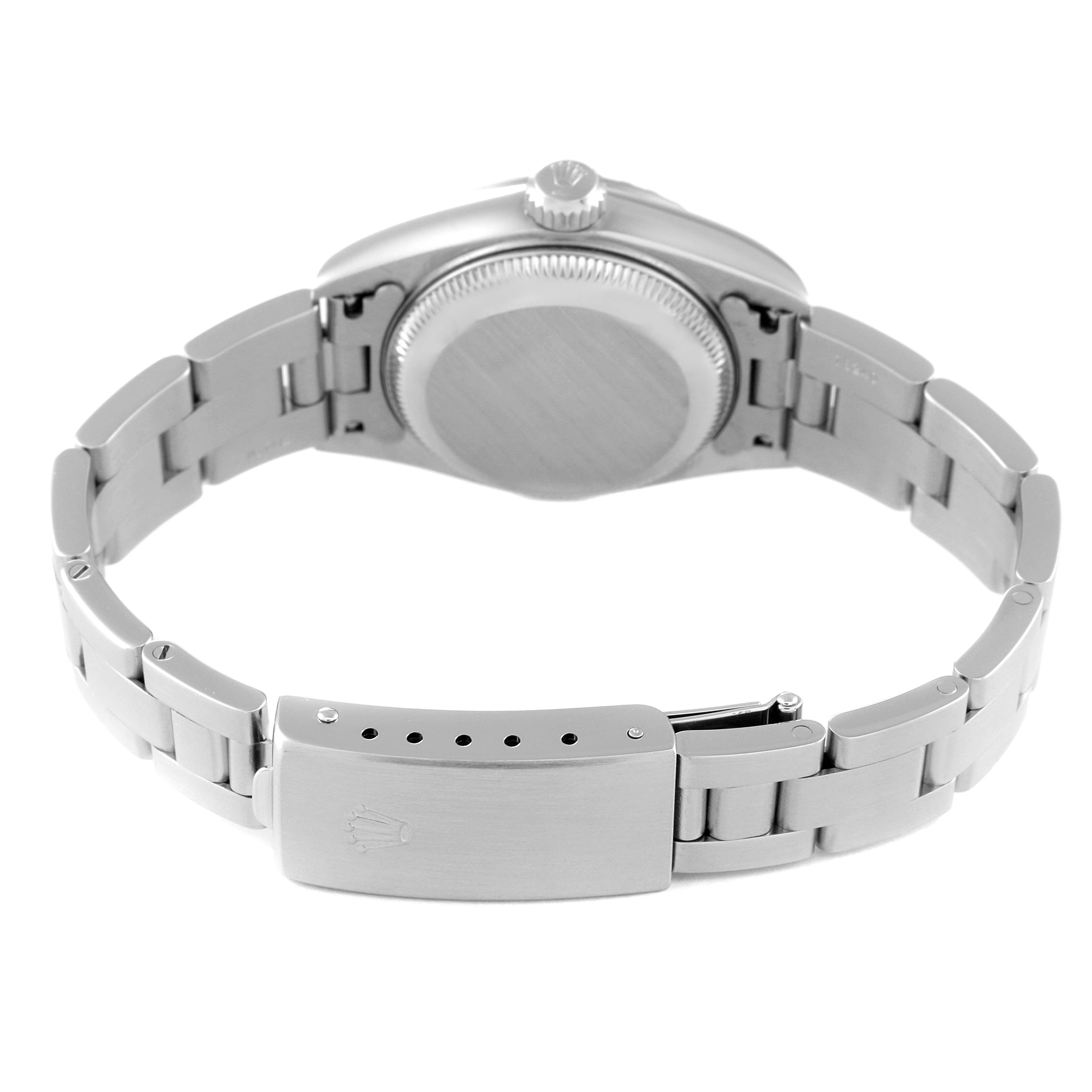 This image shows a Rolex Date 79240 Women
s Stainless Steel White Dial 79240 Women
s Stainless Steel White Dial model watch from the back, highlighting its case back, bracelet, and clasp.