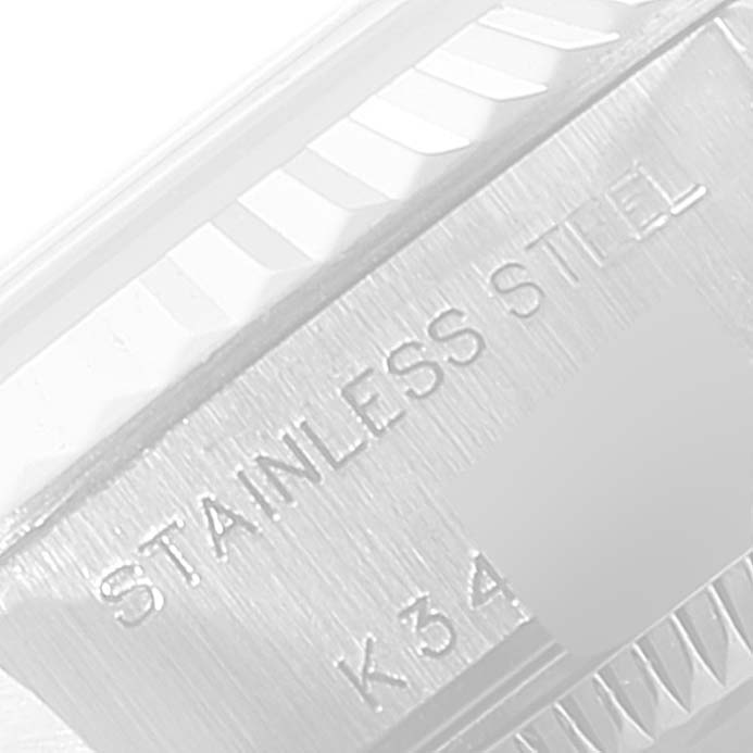 This close-up image shows the stainless steel part and the fluted bezel of the Rolex Datejust 79174 Women's Stainless Steel Pink Dial 79174 Women's Stainless Steel Pink Dial watch.