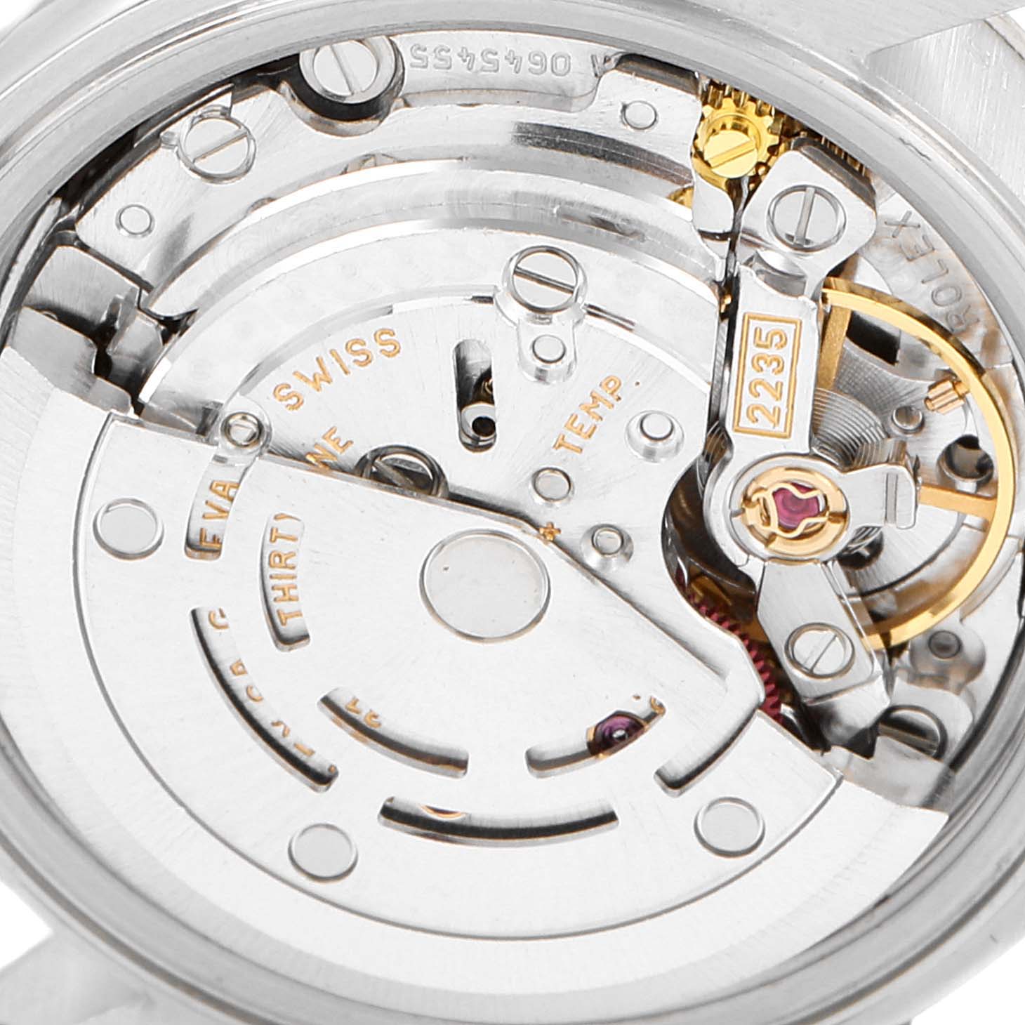 This image shows a close-up of the movement and inner mechanism of a Rolex Datejust 79174 Women's Stainless Steel Pink Dial 79174 Women's Stainless Steel Pink Dial watch.