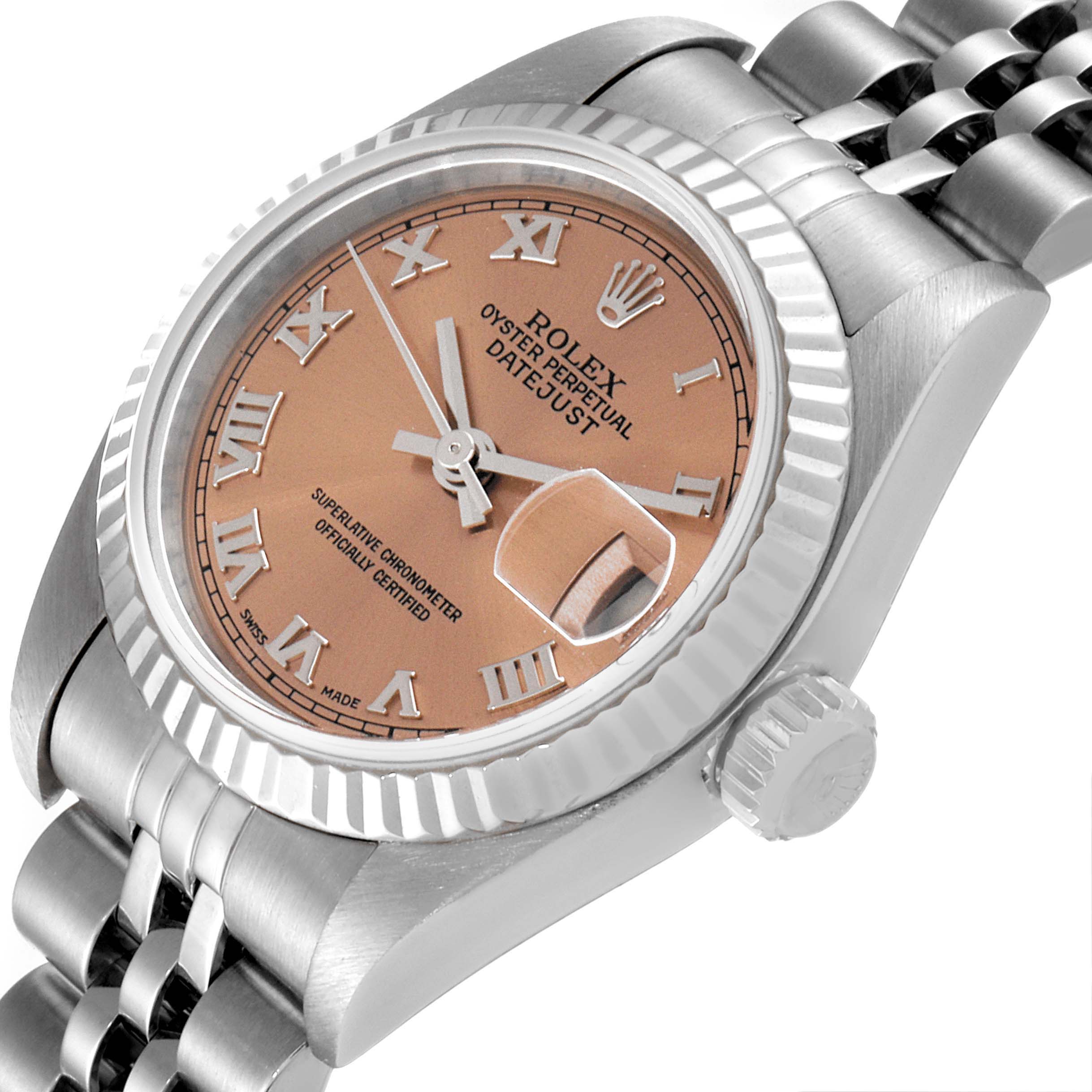 The Rolex Datejust 79174 Women's Stainless Steel Pink Dial 79174 Women's Stainless Steel Pink Dial watch is shown at an angled close-up, highlighting its dial, bezel, crown, and part of the bracelet.