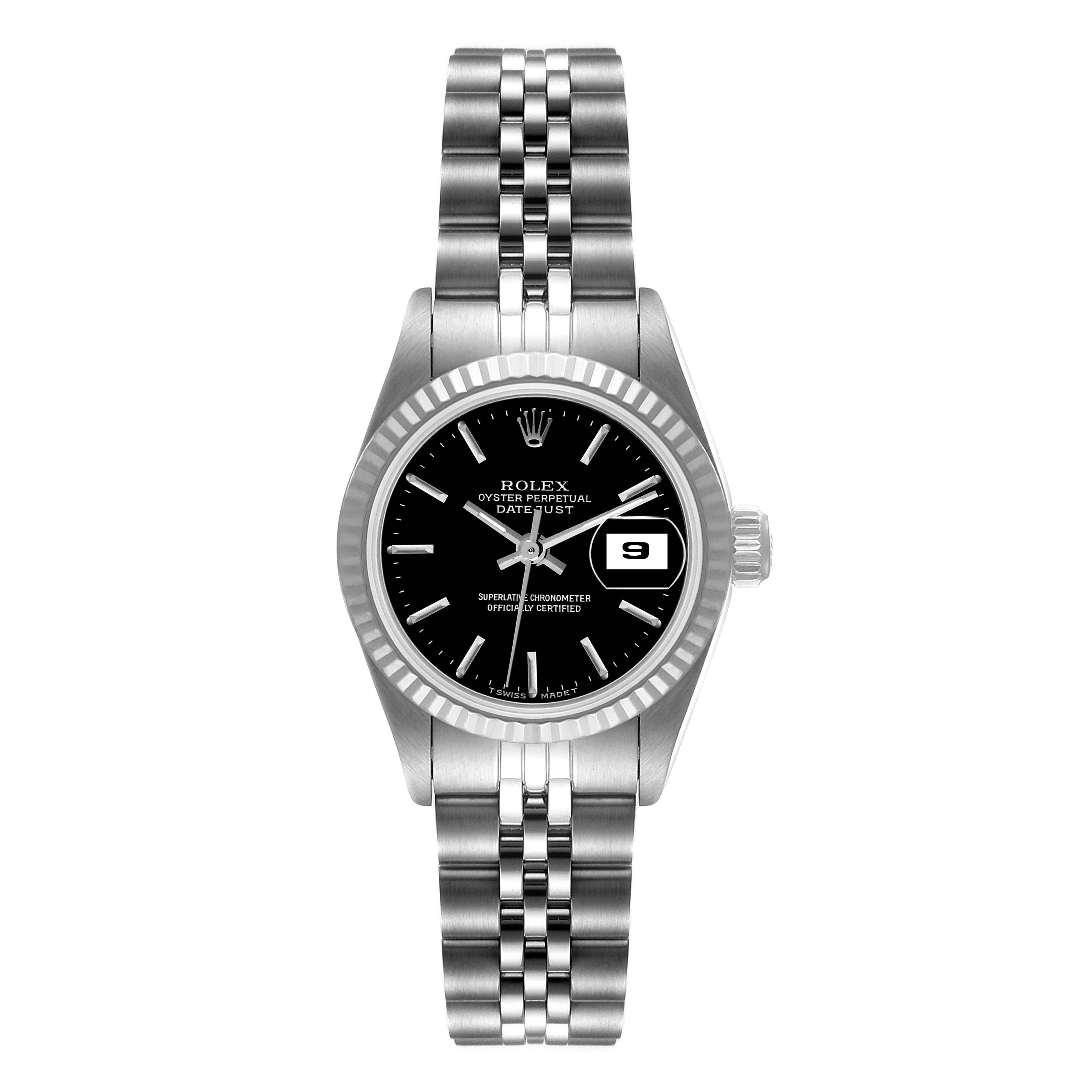 The image shows a frontal view of a Rolex Datejust 69174 Women
s Stainless Steel Black Dial 69174 Women
s Stainless Steel Black Dial watch, highlighting its bracelet, black dial, date window, and fluted bezel.
