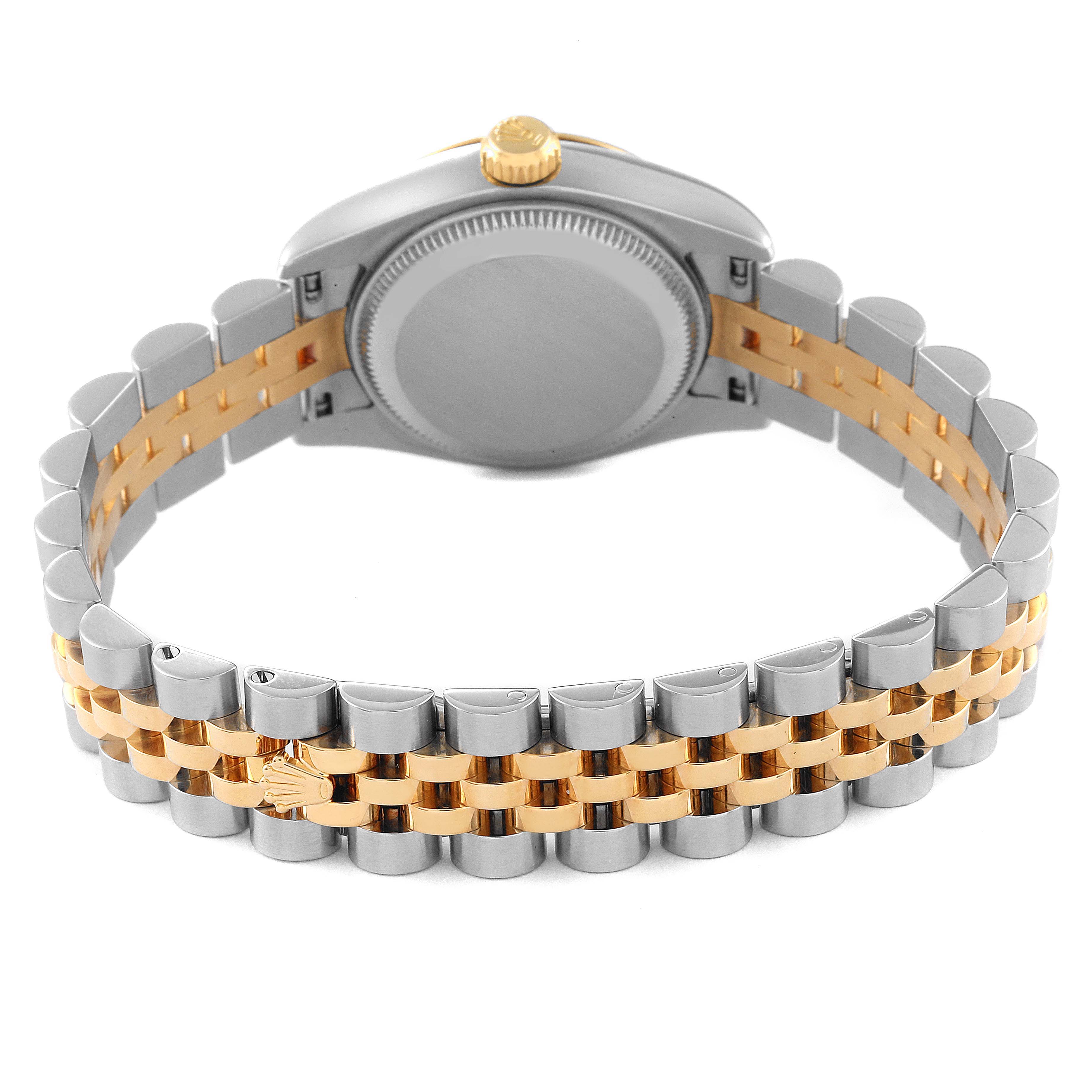 The image shows the backside of a Rolex Datejust 179173 Women's Steel and Gold (two tone) Champagne Dial 179173 Women's Steel and Gold (two tone) Champagne Dial watch, highlighting the case back, crown, and two-tone bracelet.