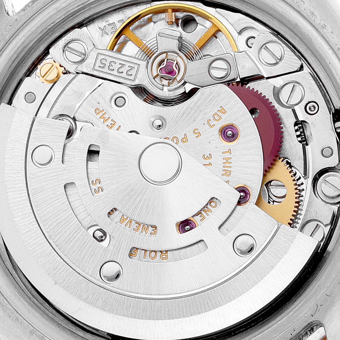 This image shows the intricate internal movement mechanism of a Rolex Datejust 179173 Women's Steel and Gold (two tone) Champagne Dial 179173 Women's Steel and Gold (two tone) Champagne Dial watch.