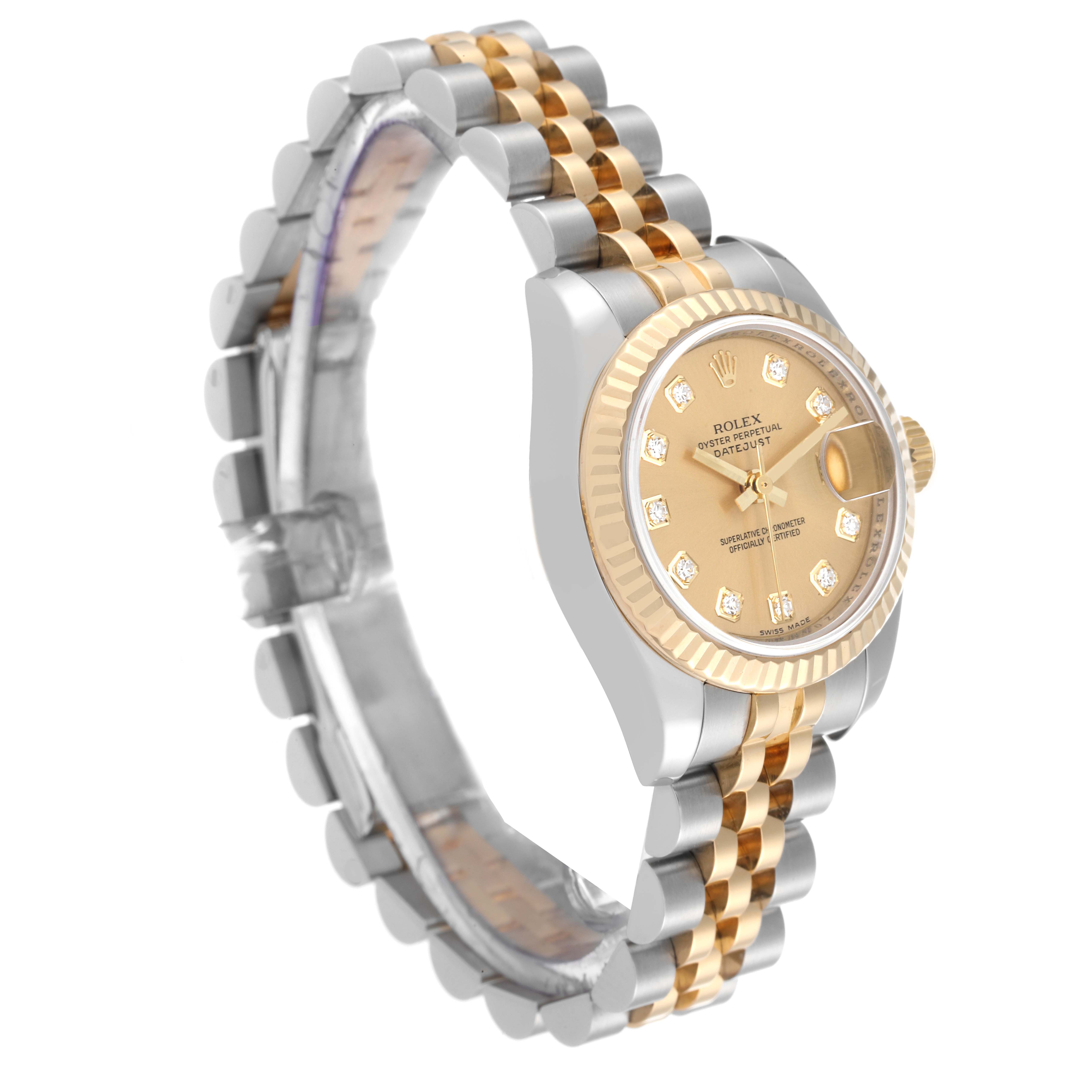 The image shows a Rolex Datejust 179173 Women's Steel and Gold (two tone) Champagne Dial 179173 Women's Steel and Gold (two tone) Champagne Dial watch at a three-quarter angle, revealing the bracelet, face, and side profile.