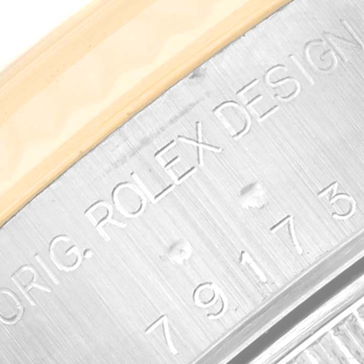 Close-up of the caseback engraving on a Rolex Datejust 79173 Women's Steel and Gold (two tone) Mother of Pearl Dial 79173 Women's Steel and Gold (two tone) Mother of Pearl Dial watch.