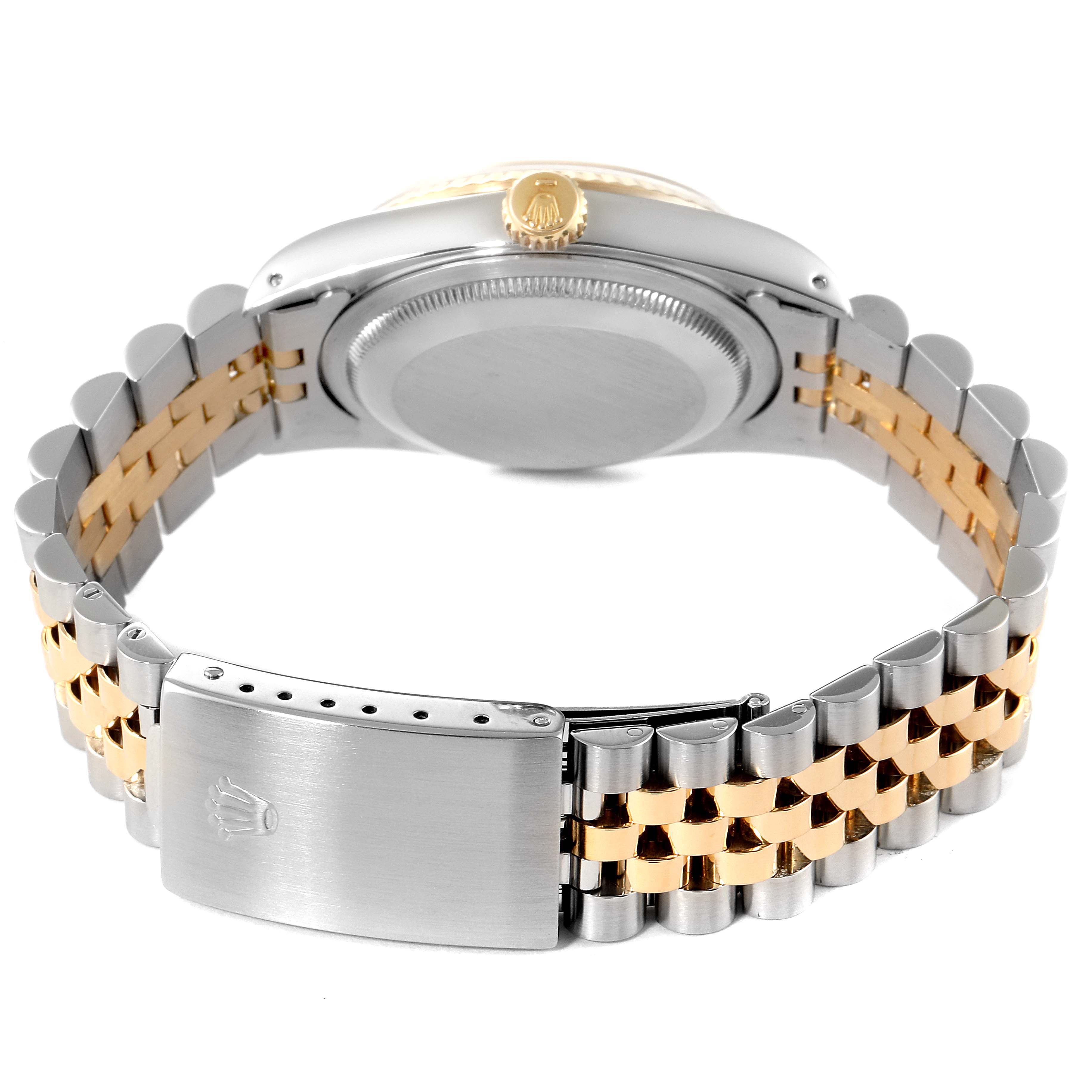 This image shows the back view of a Rolex Datejust 16233 Men's Steel and Gold (two tone) Silver Dial 16233 Men's Steel and Gold (two tone) Silver Dial, highlighting its two-tone Jubilee bracelet and closed clasp.