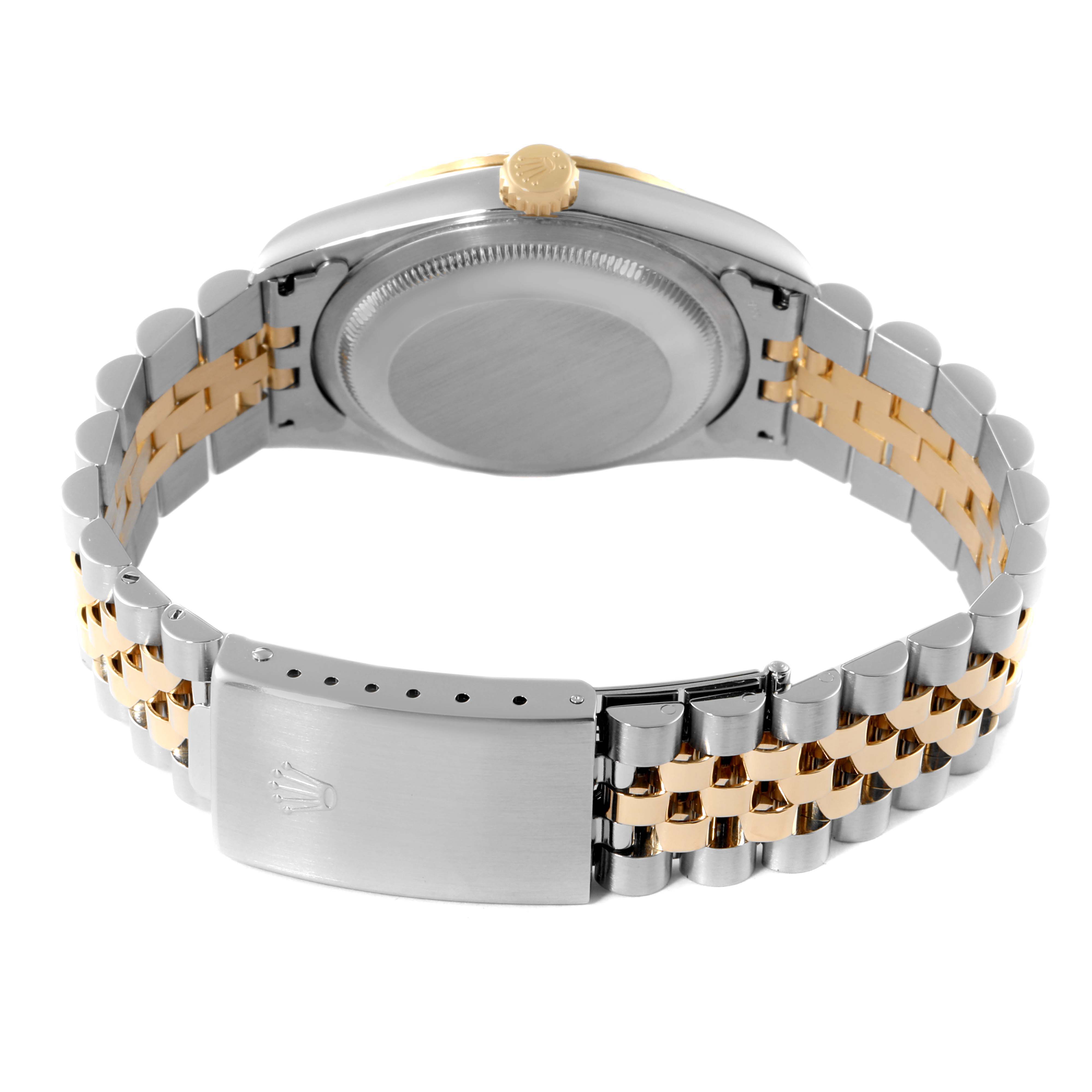 The image displays the backside of a Rolex Datejust 16233 Men's Steel and Gold (two tone) Silver Dial 16233 Men's Steel and Gold (two tone) Silver Dial watch, highlighting the case back, crown, and Jubilee bracelet with a clasp.