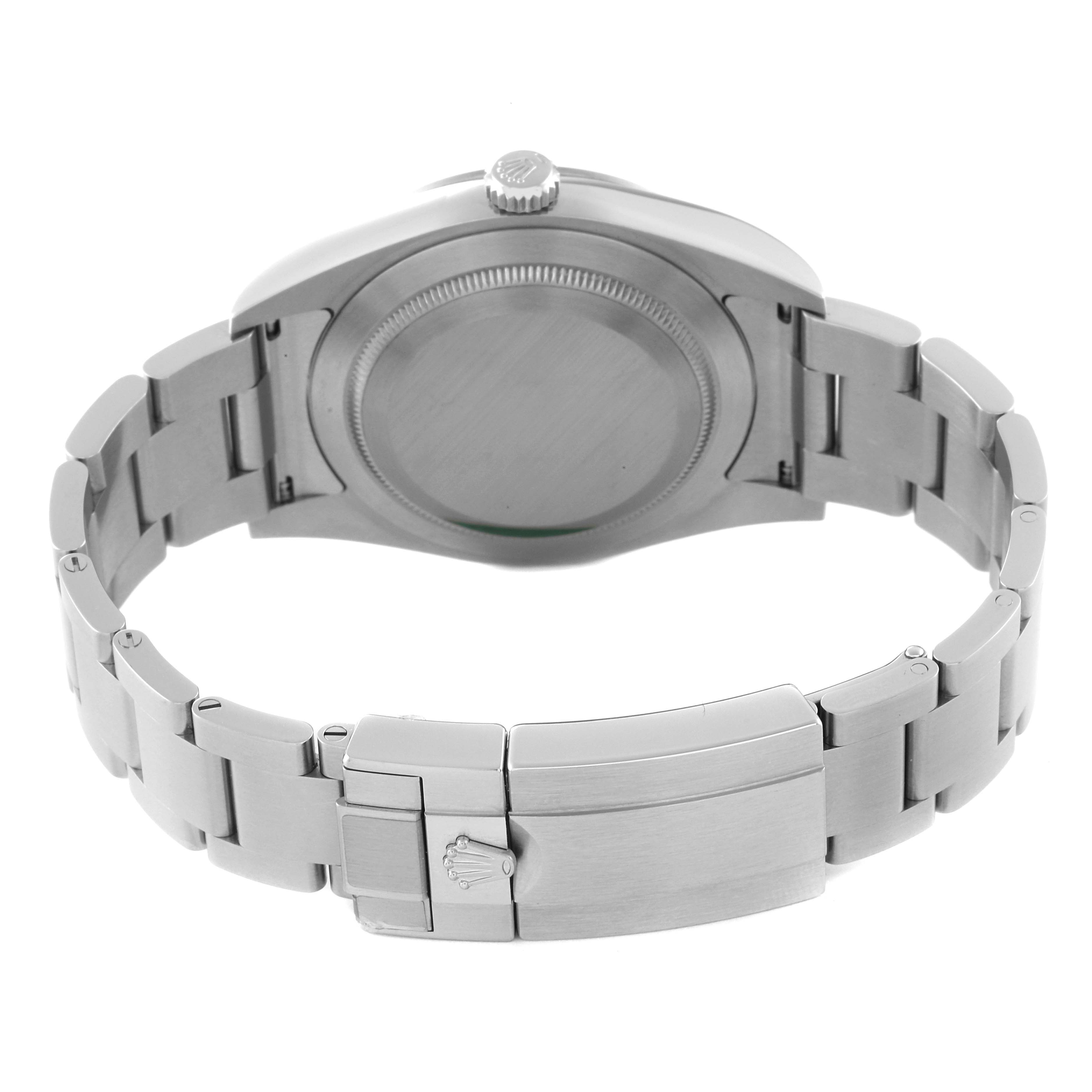 The image shows the back case and bracelet of the Rolex Explorer 214270 Men
s Stainless Steel Black Dial 214270 Men
s Stainless Steel Black Dial watch, including the clasp with the Rolex logo.