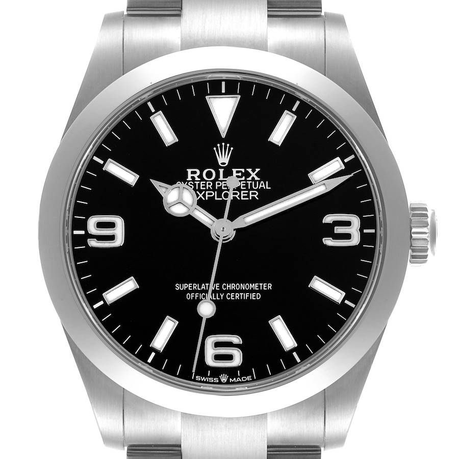 The Rolex Explorer watch is shown from the front, displaying the dial, bezel, crown, and part of the bracelet.