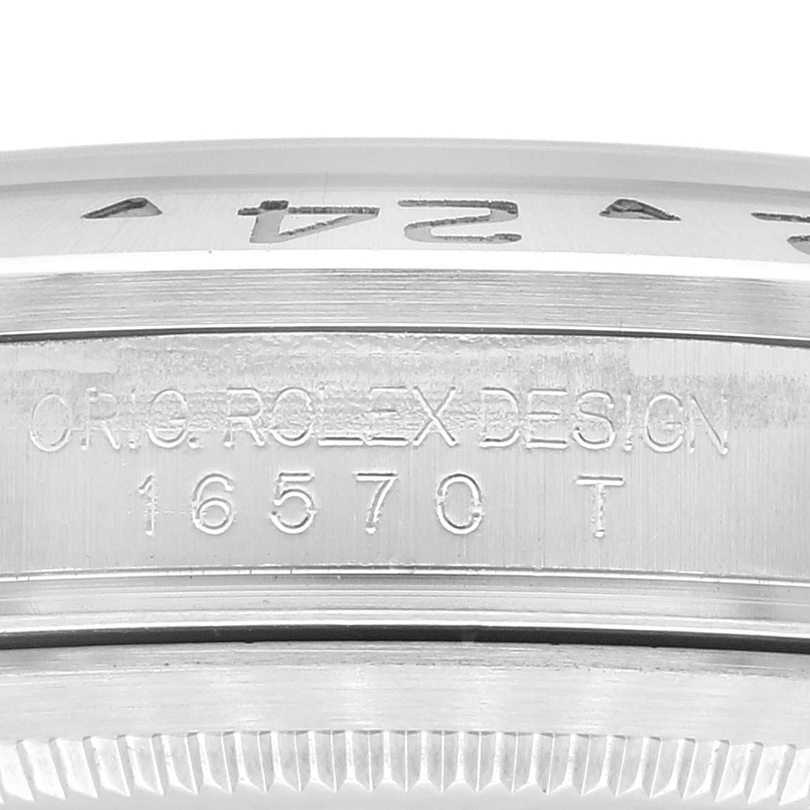 This image shows a close-up of the engraving on the outer case back of a Rolex Explorer 16570 Men
s Stainless Steel White Dial 16570 Men
s Stainless Steel White Dial model 16570 watch.