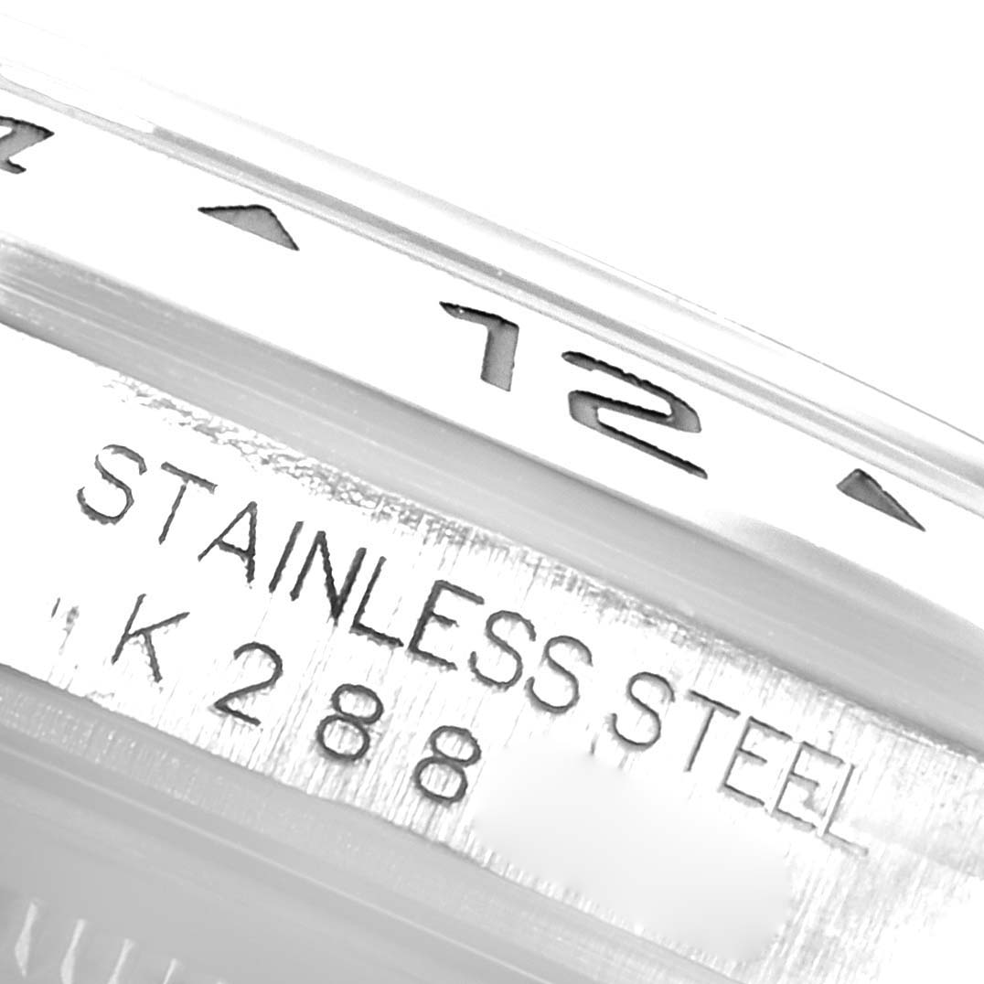 This close-up shows the bezel and casing with engravings of a Rolex Explorer 16570 Men
s Stainless Steel Black Dial 16570 Men
s Stainless Steel Black Dial model made from stainless steel.